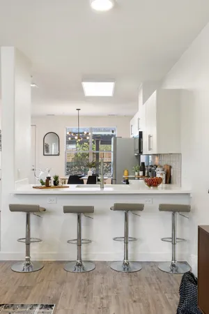 a view of living room with furniture and window