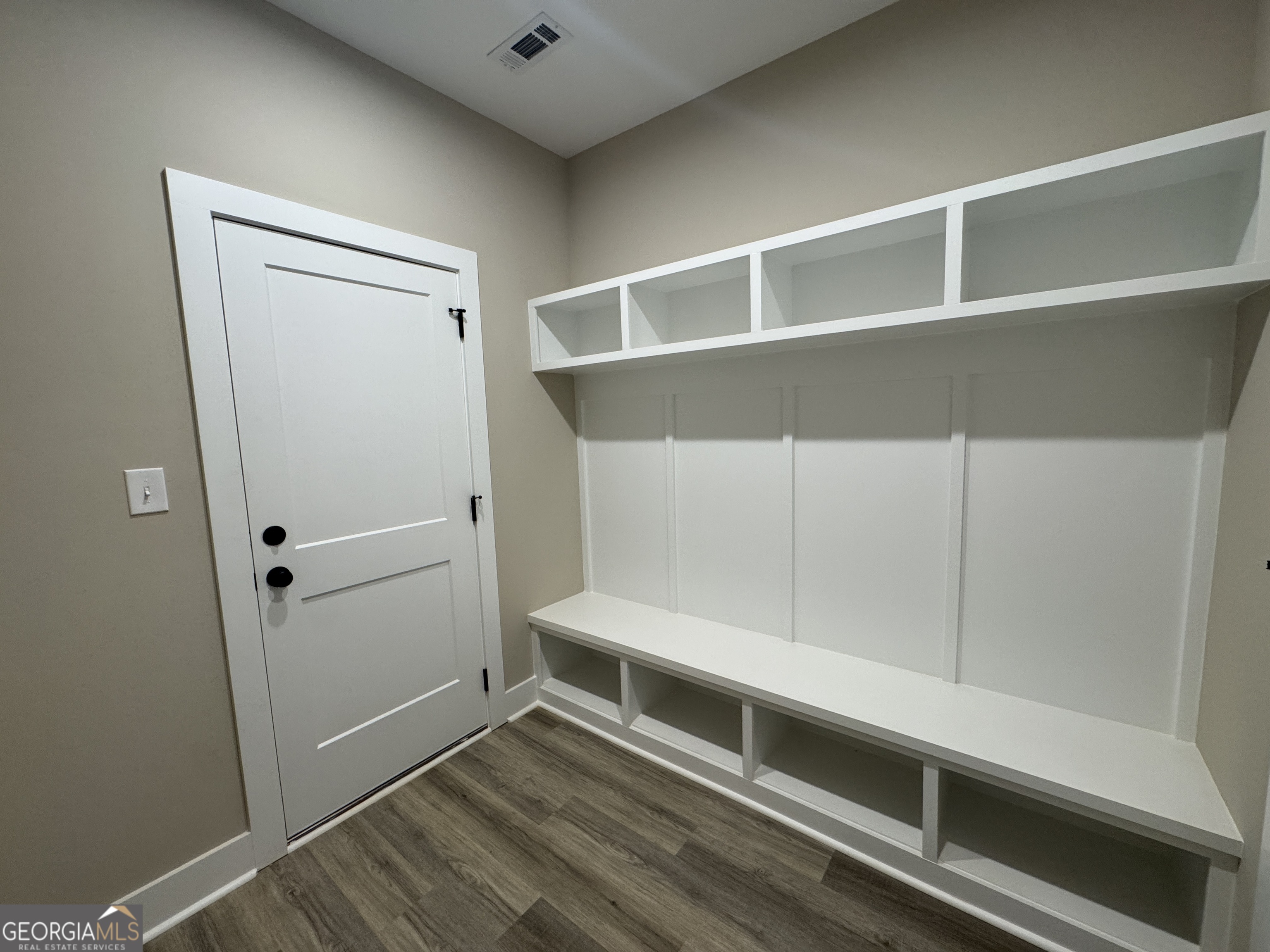 100 Melville Brown Road Williamson, GA 30292 - Photo 14 of 21 a hallway with cabinet