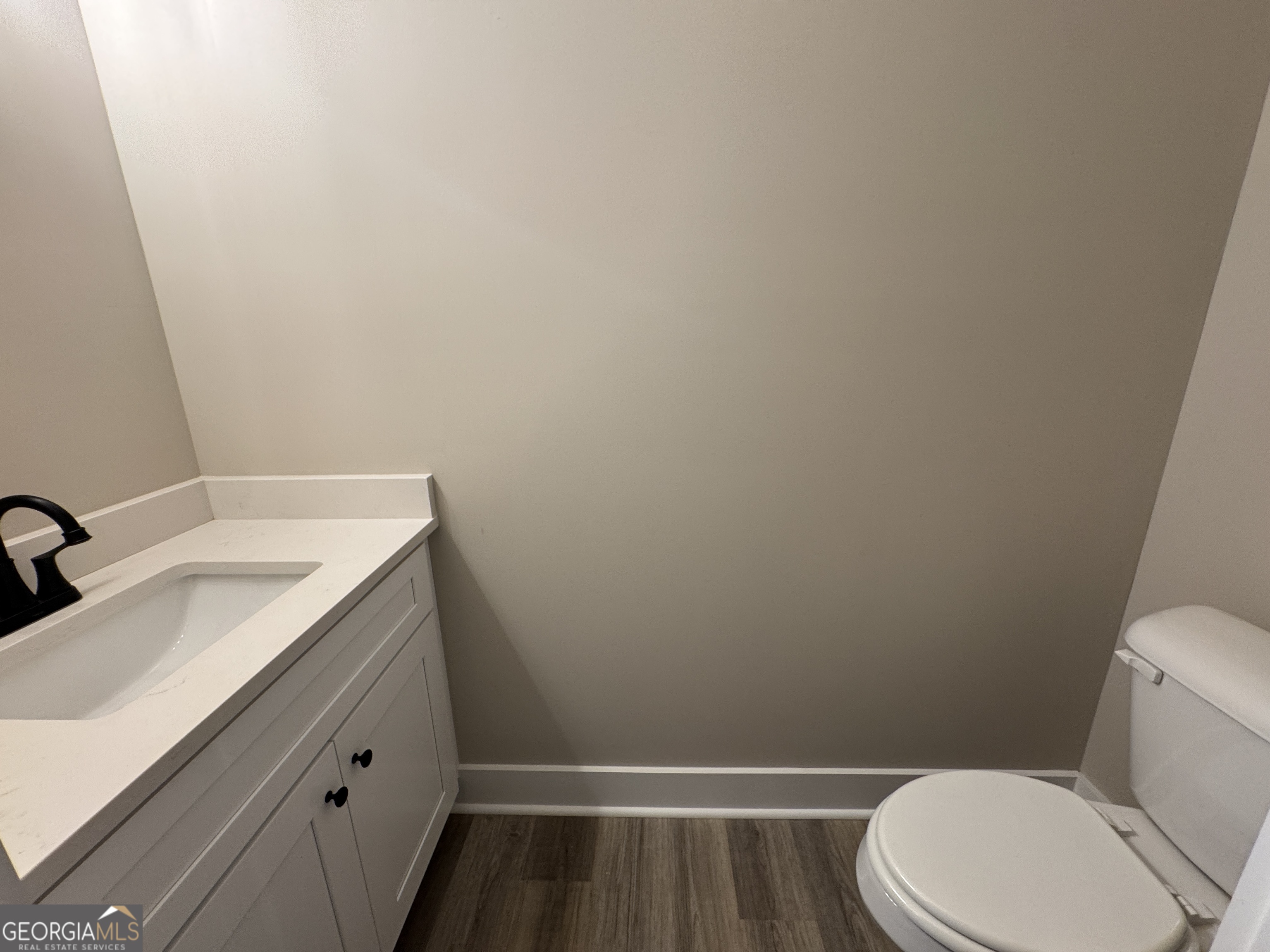 100 Melville Brown Road Williamson, GA 30292 - Photo 15 of 21 a bathroom with a sink and a toilet