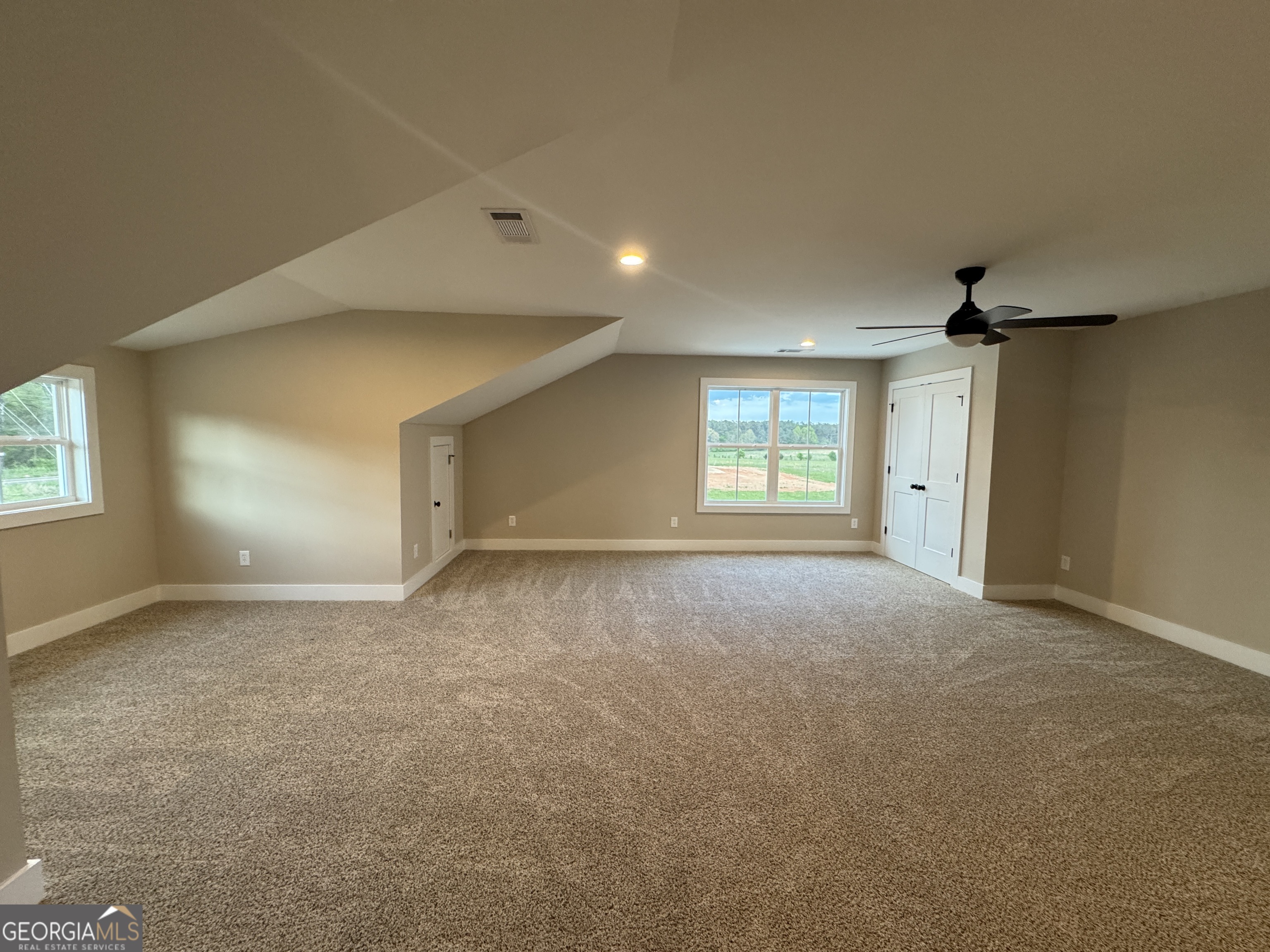 100 Melville Brown Road Williamson, GA 30292 - Photo 19 of 21 a view of an empty room with a window