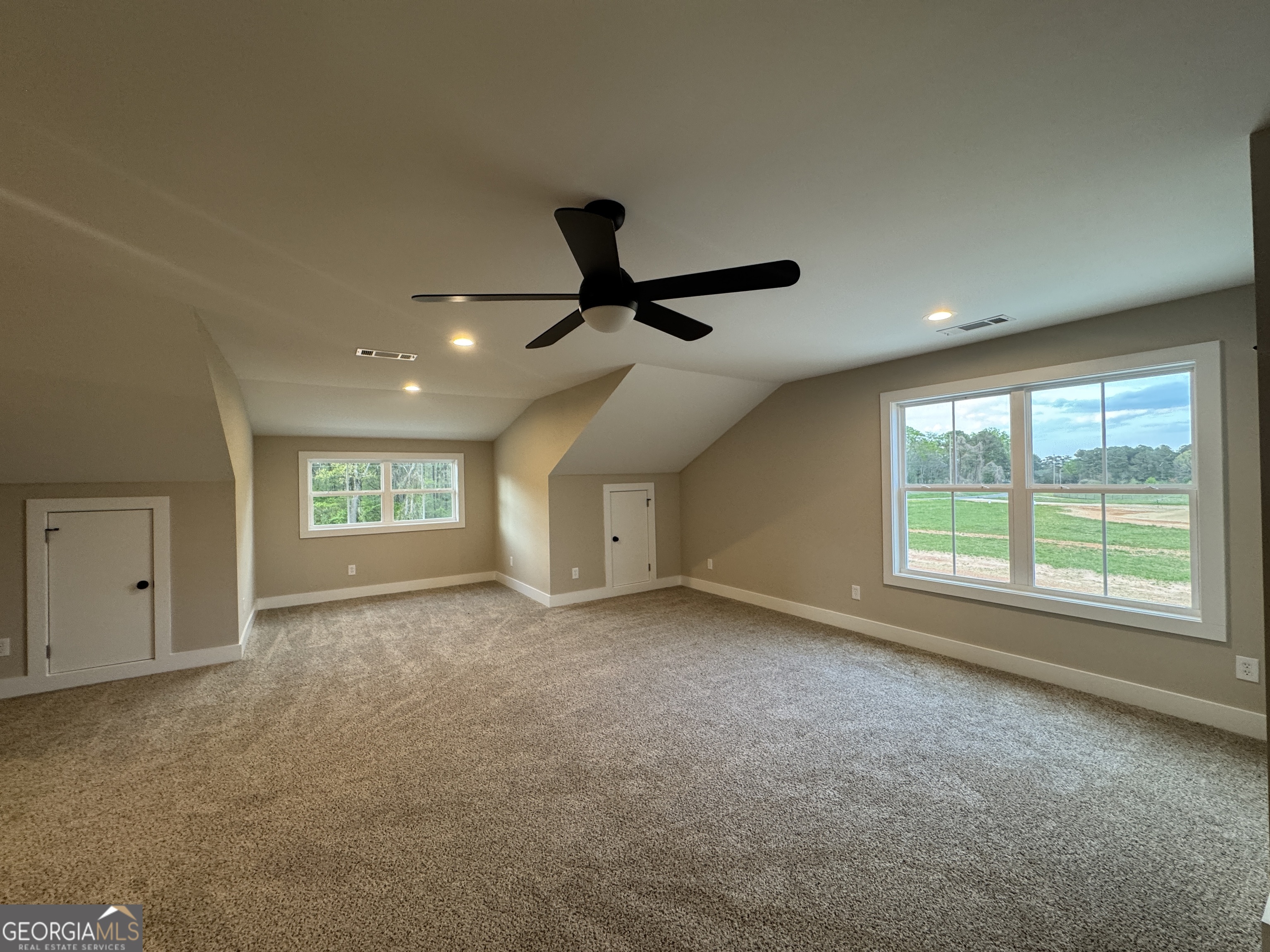 100 Melville Brown Road Williamson, GA 30292 - Photo 20 of 21 a view of an empty room with a window