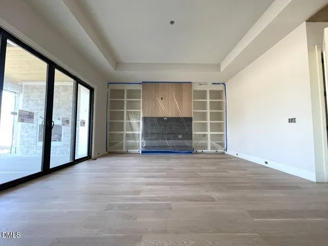 a view of an entryway with kitchen