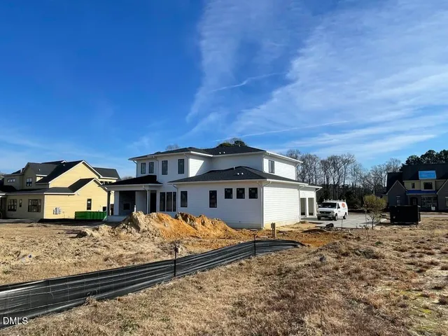 a view of a yard with an outdoor space