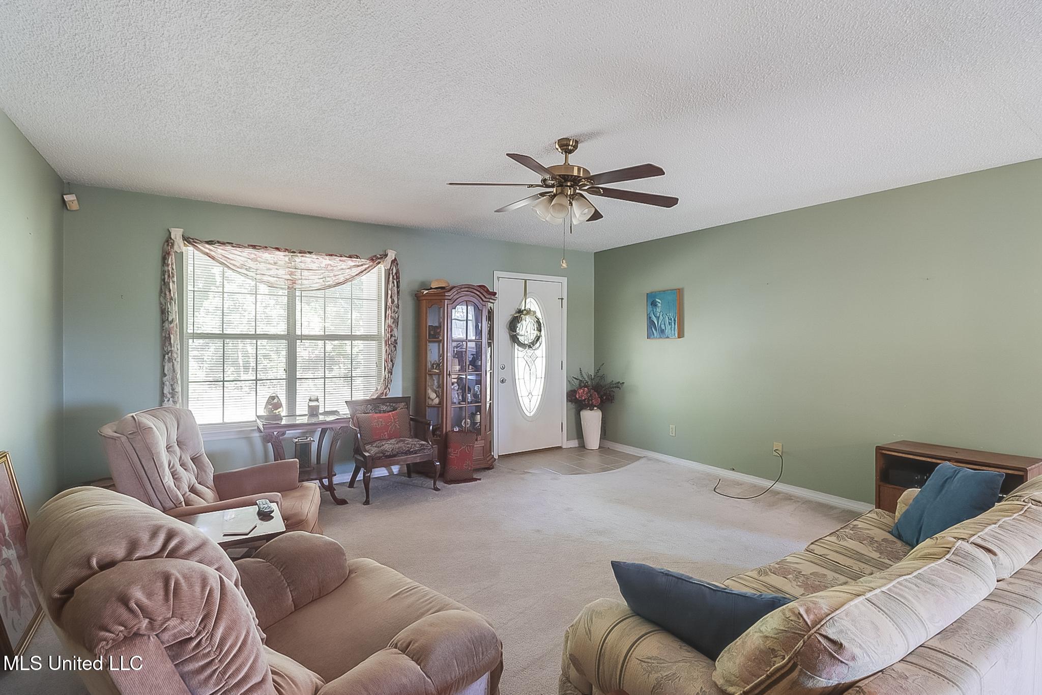 26193 Elmer Ladner Road Pass Christian, MS 39571 - Photo 4 of 27 Living Room