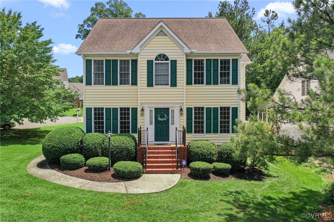 3321 Ceres Road Henrico, VA 23294 - Photo 1 of 38 a view of a white house with a big yard and potted plants
