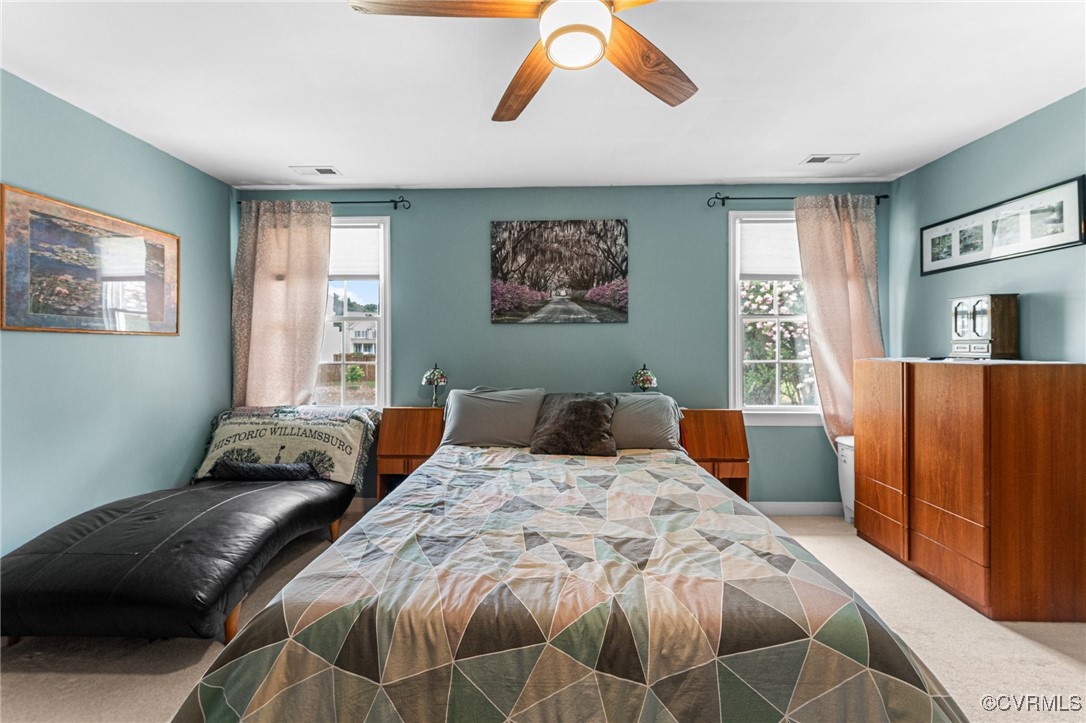 3321 Ceres Road Henrico, VA 23294 - Photo 16 of 38 a bedroom with a bed and wooden floor