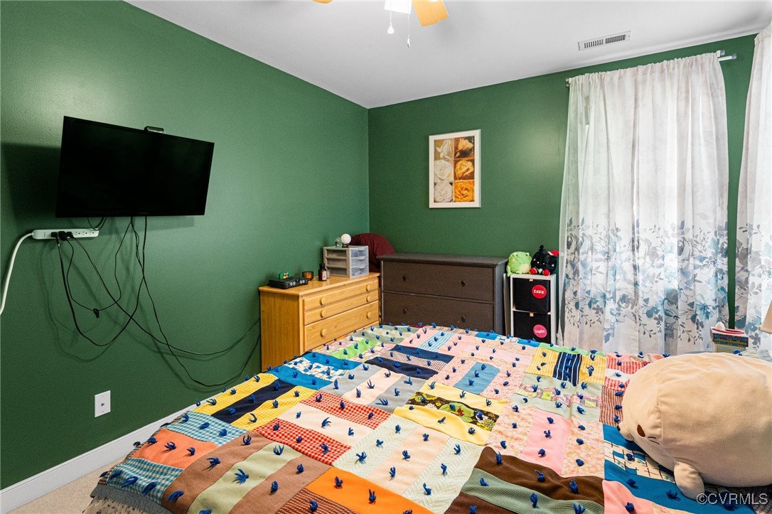 3321 Ceres Road Henrico, VA 23294 - Photo 21 of 38 a bedroom with a bed and a television