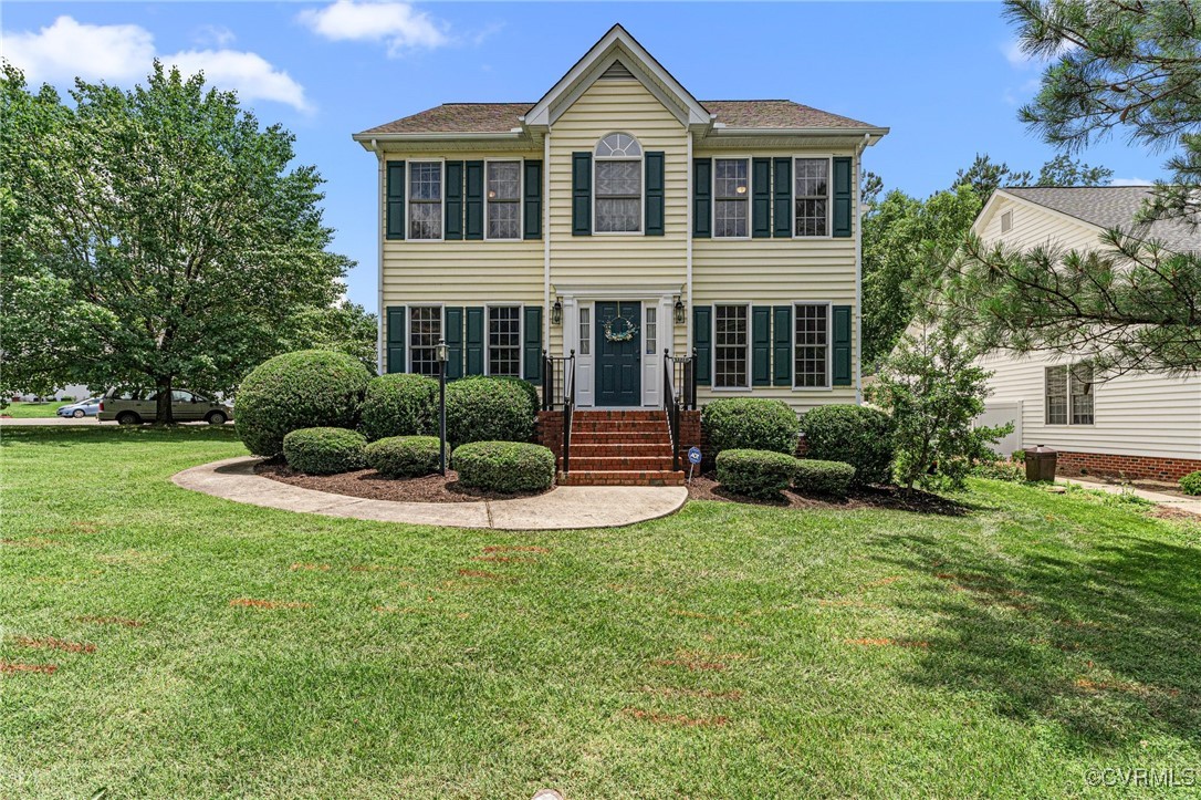 3321 Ceres Road Henrico, VA 23294 - Photo 3 of 38 a house with a garden and yard