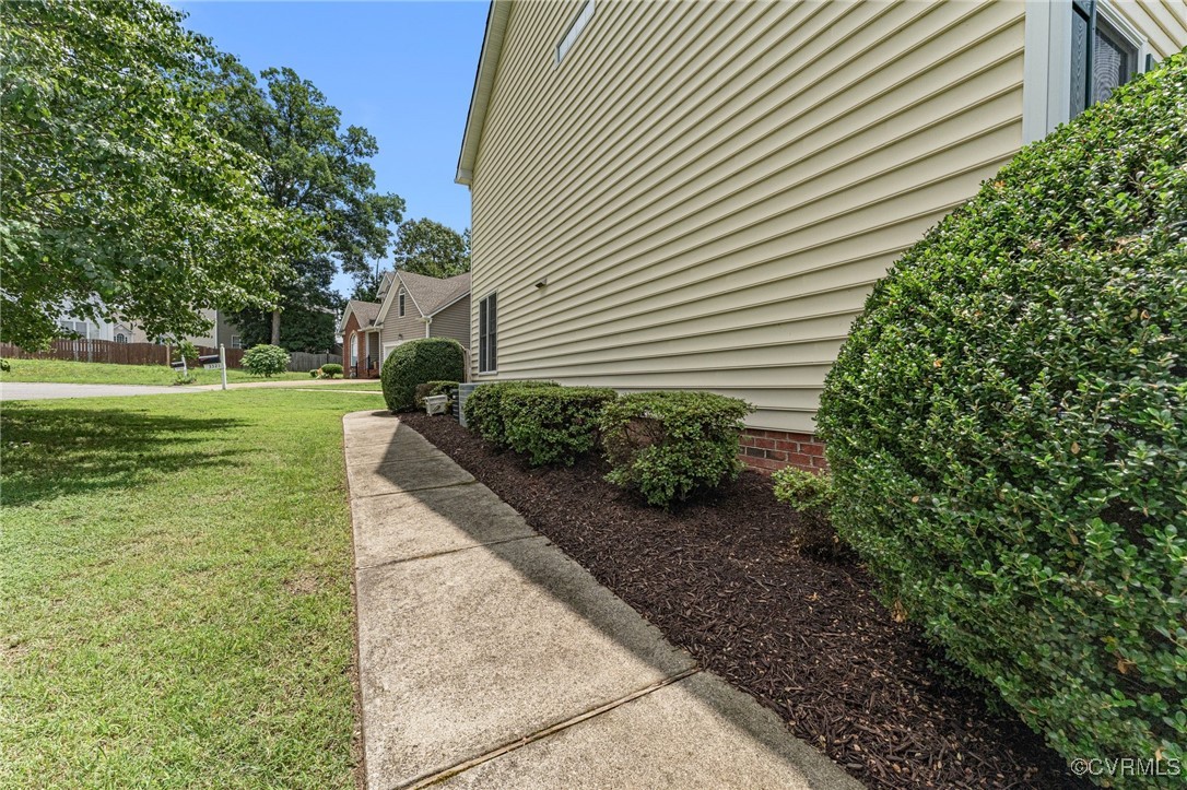 3321 Ceres Road Henrico, VA 23294 - Photo 32 of 38 a view of a backyard with plants and trees