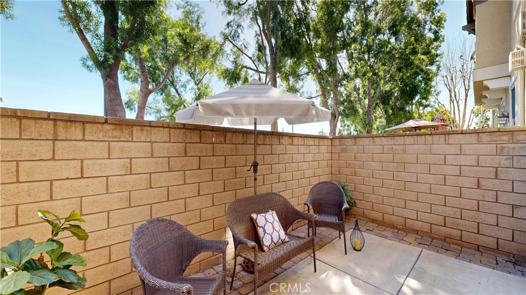 10375 Church Street, Unit 100 Rancho Cucamonga, CA 91730 - Photo 24 of 29 a view of a chairs and table in backyard