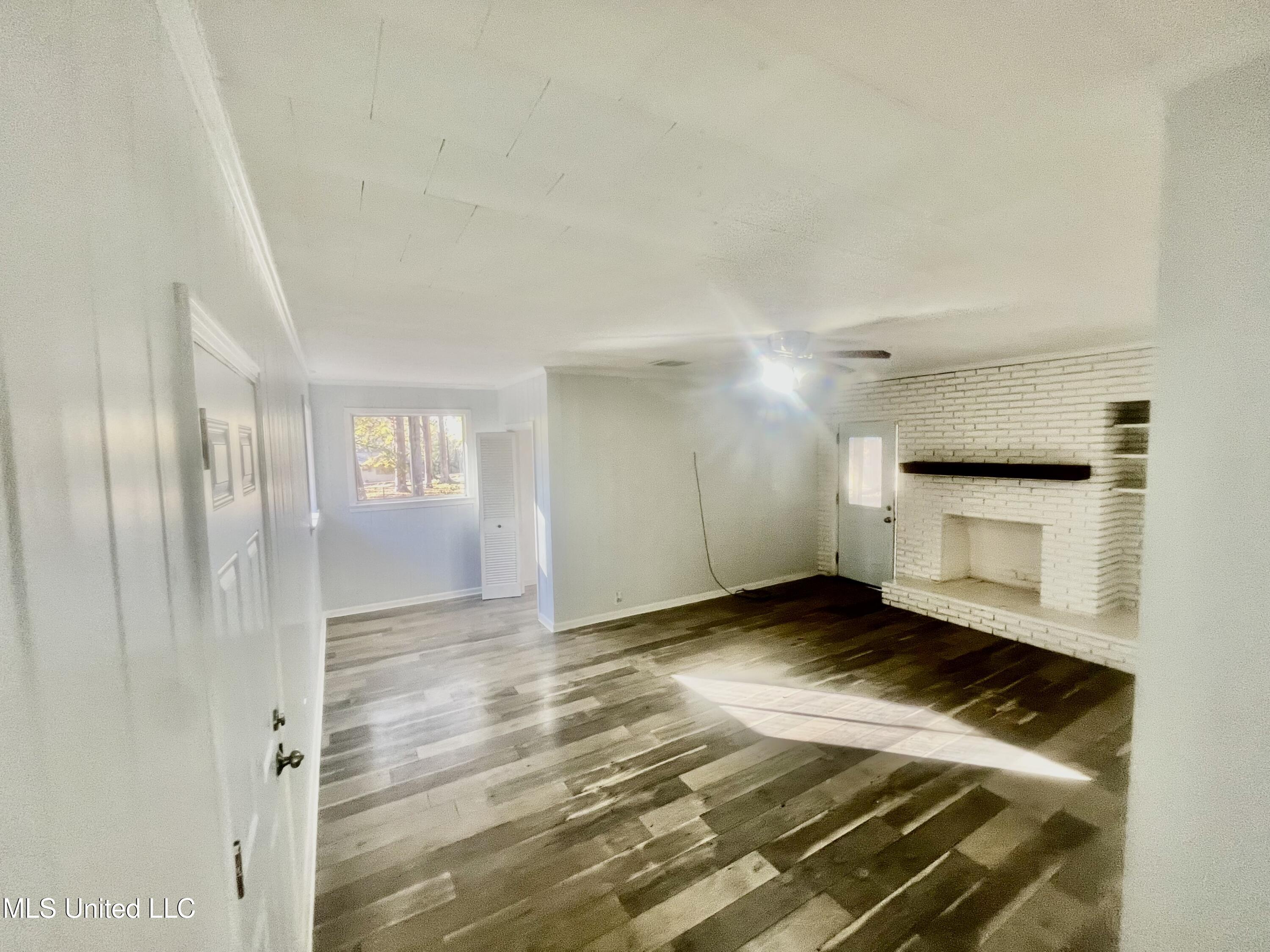 414 Hardy Lane Brookhaven, MS 39601 - Photo 3 of 5 den with fireplace