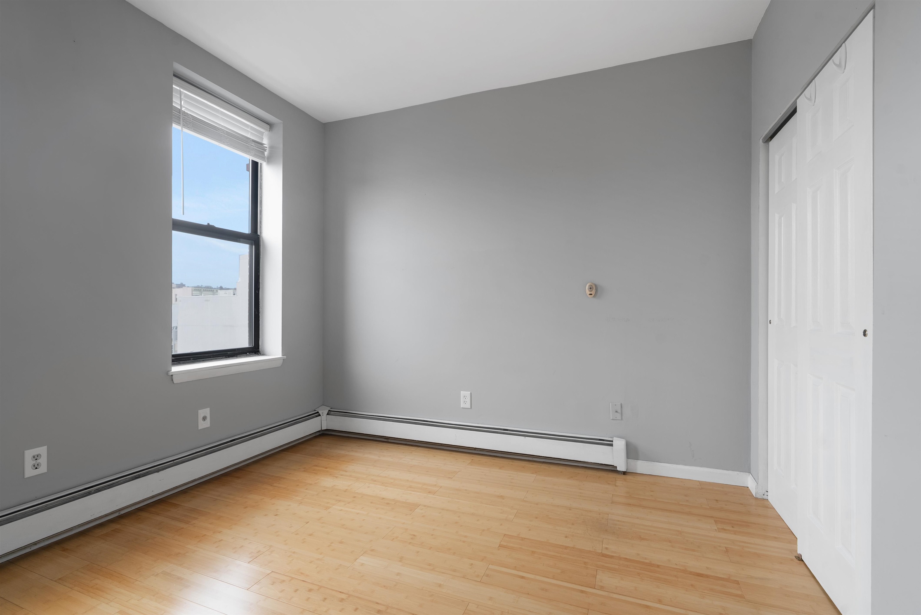 809 Park Avenue, Unit 9 Hoboken, NJ 07030 - Photo 16 of 30 wooden floor in an empty room