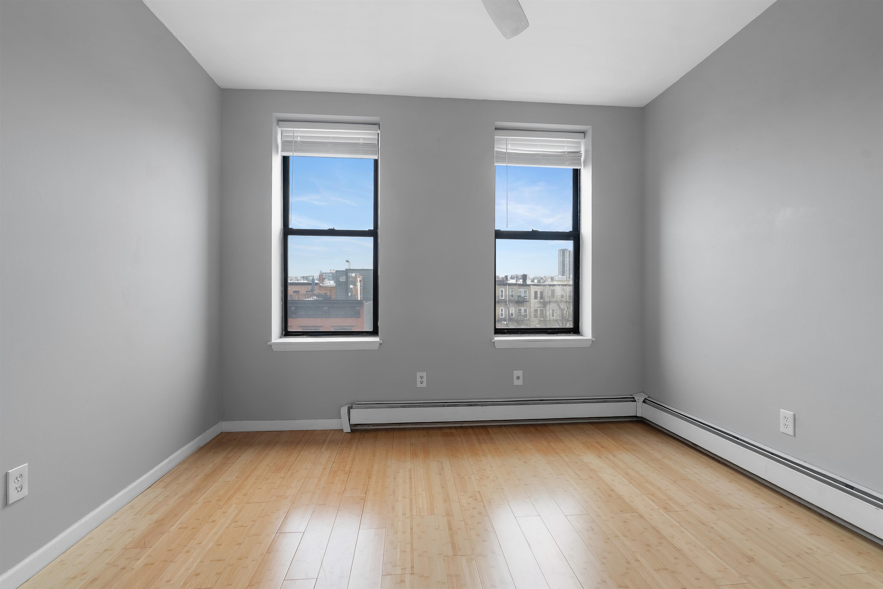 809 Park Avenue, Unit 9 Hoboken, NJ 07030 - Photo 17 of 30 an empty room with window
