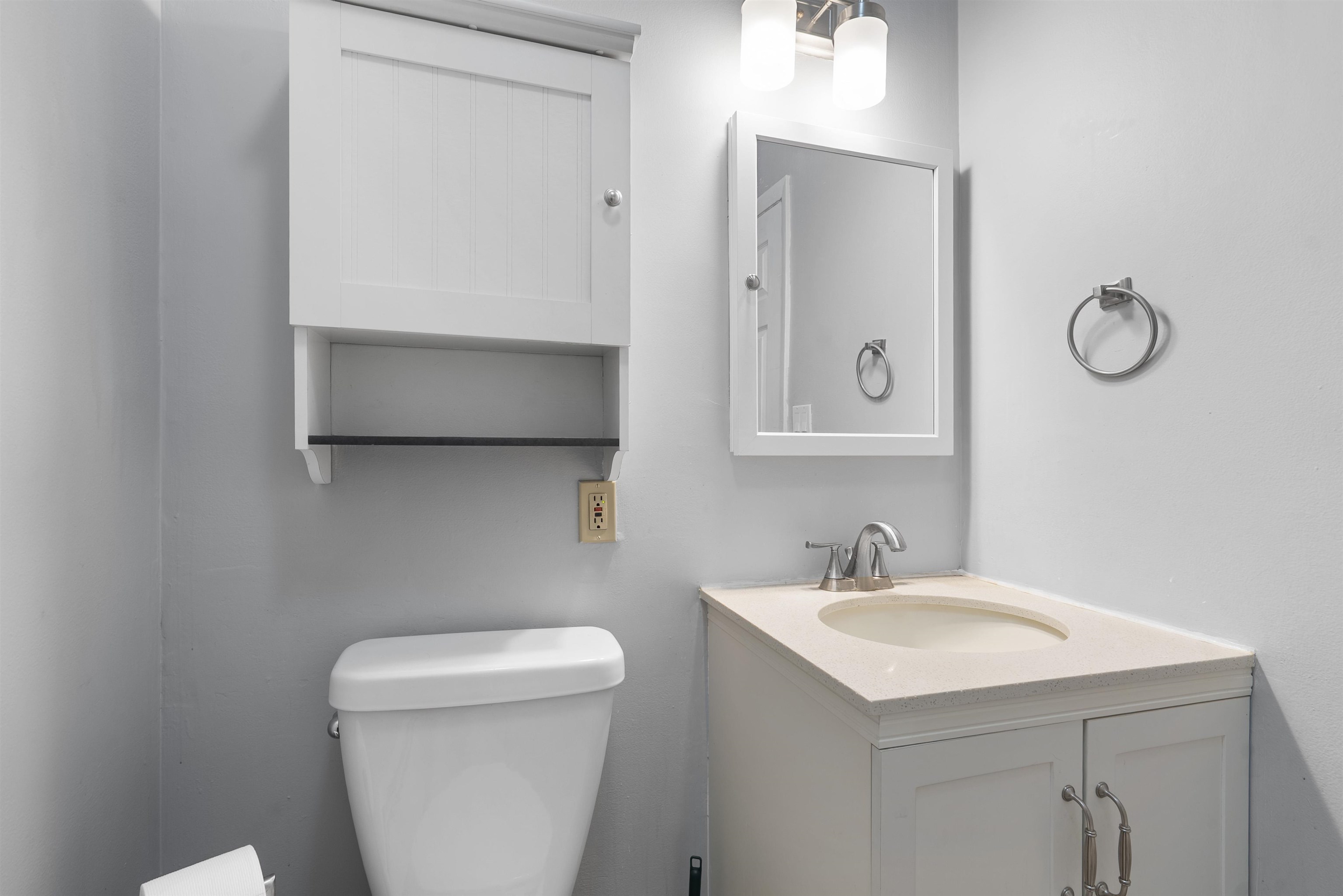 809 Park Avenue, Unit 9 Hoboken, NJ 07030 - Photo 19 of 30 a bathroom with a sink toilet and vanity