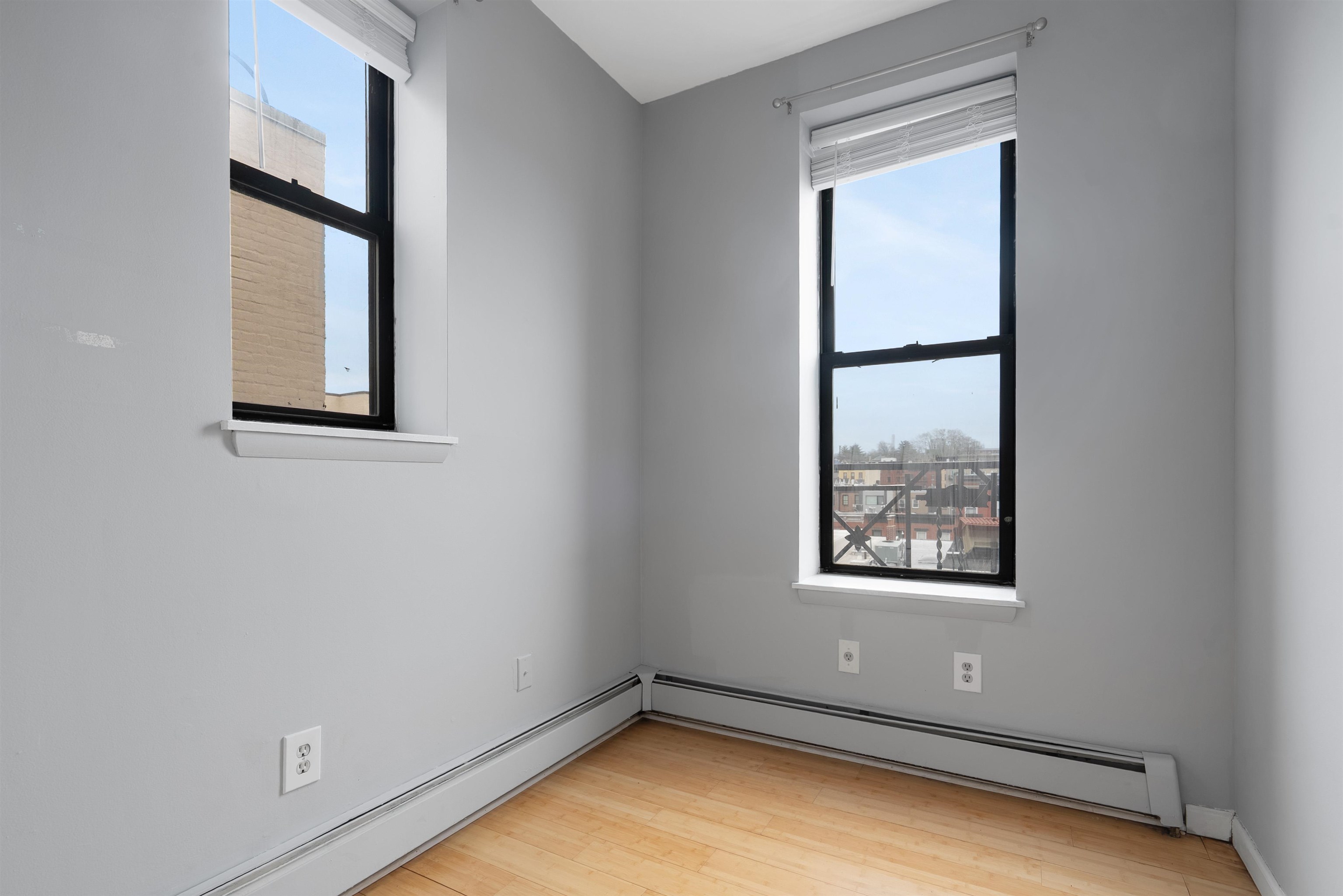 809 Park Avenue, Unit 9 Hoboken, NJ 07030 - Photo 24 of 30 an empty room with a window