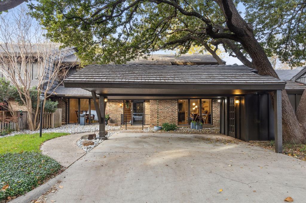 7057 Helsem Way, Unit 150 Dallas, TX 75230 - Photo 1 of 1 a house view with a outdoor space