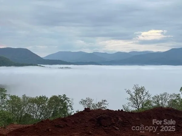 a view of lake with mountain