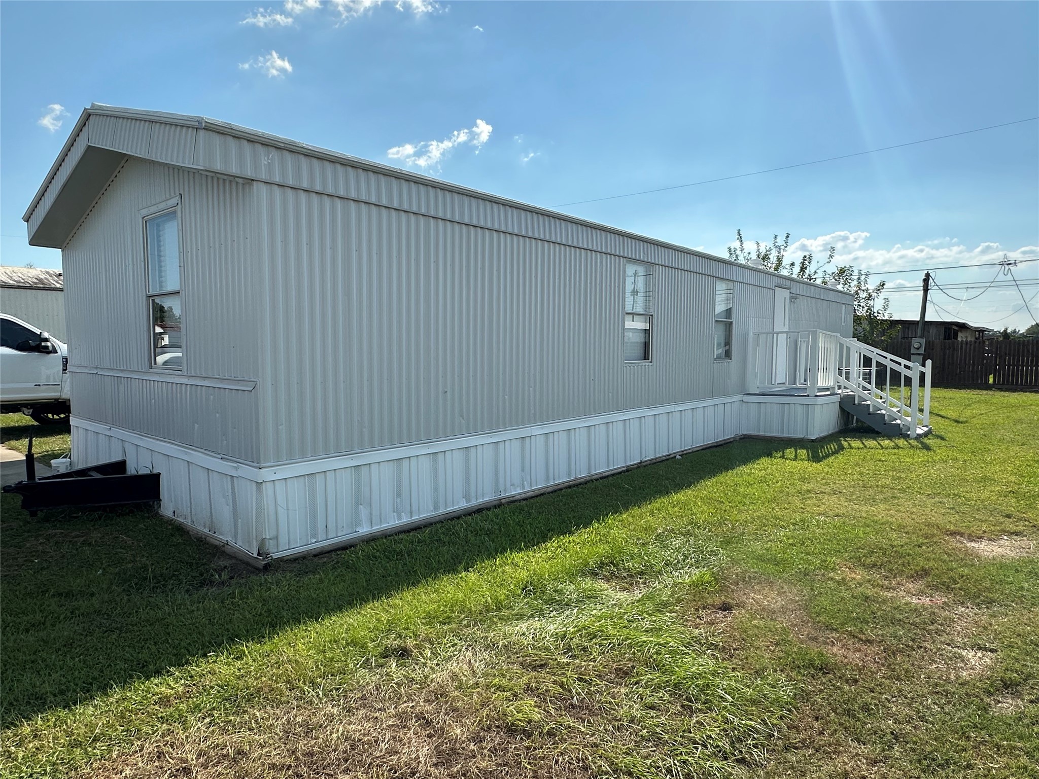 2021 North Battlebell Road, Unit 15 Highlands, TX 77562 - Photo 2 of 9 a view of a backyard