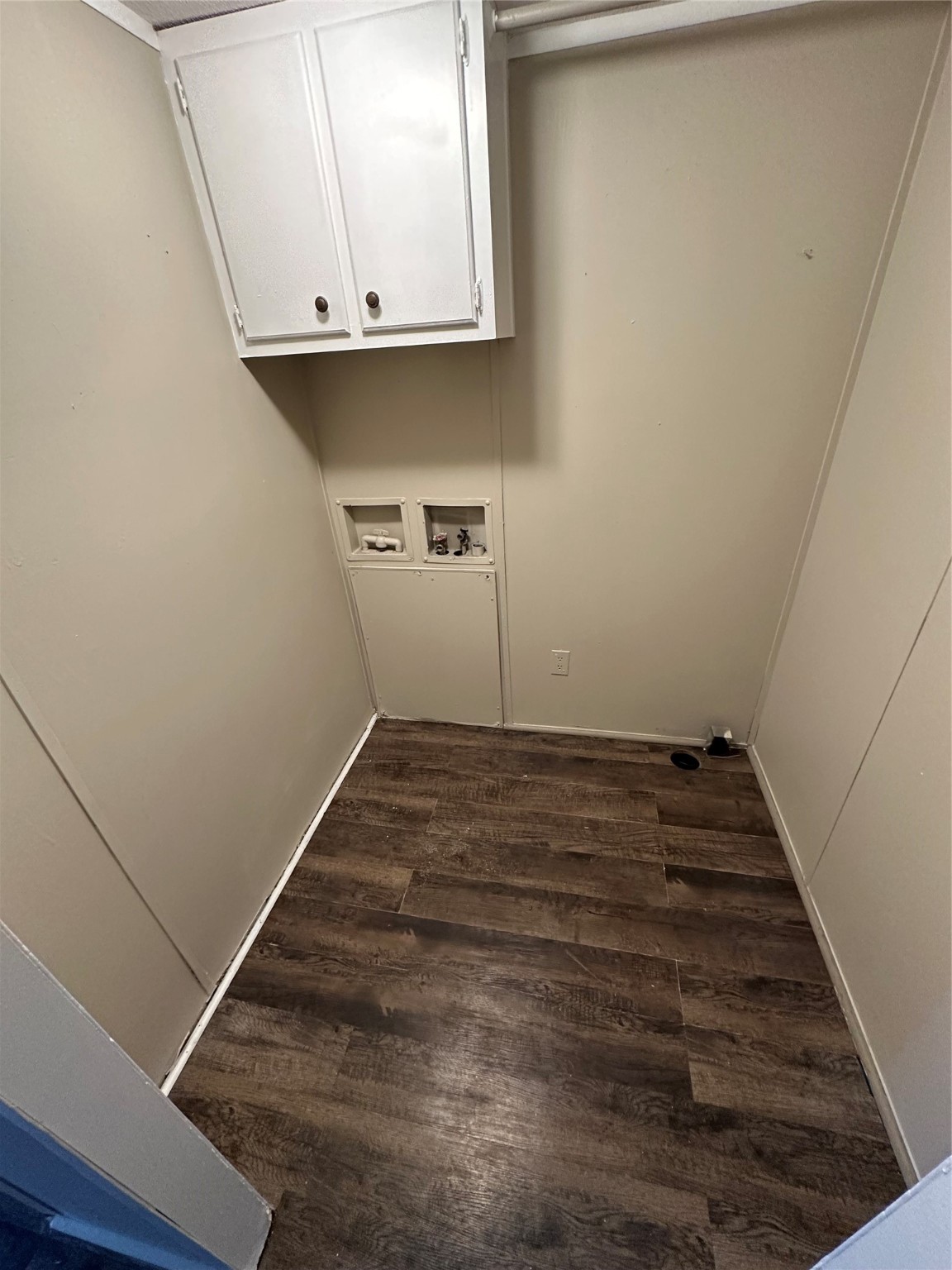 2021 North Battlebell Road, Unit 15 Highlands, TX 77562 - Photo 5 of 9 a view of a room with wooden floor and white walls