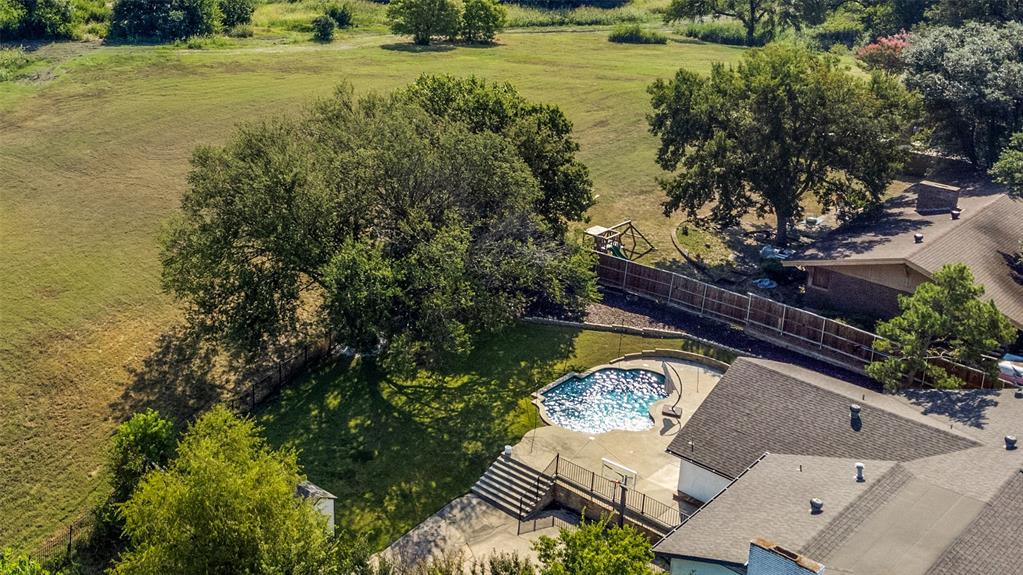 2910 South Country Club Road Garland, TX 75043 - Photo 37 of 40 Peaceful setting with mature trees and a beautiful view