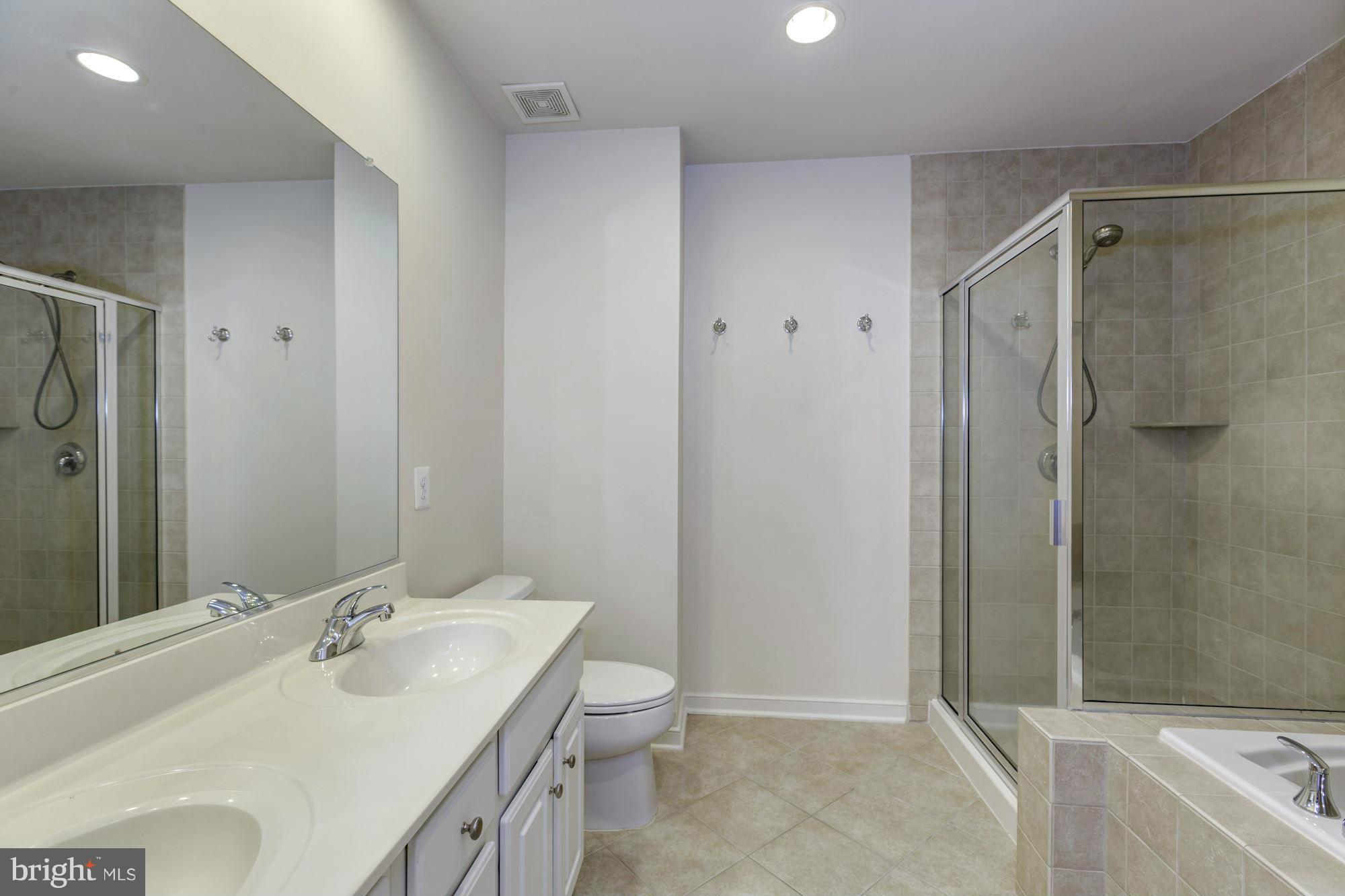 11110 Amherst Avenue Silver Spring, MD 20902 - Photo 17 of 28 dual sinks, shower + jetted tub
