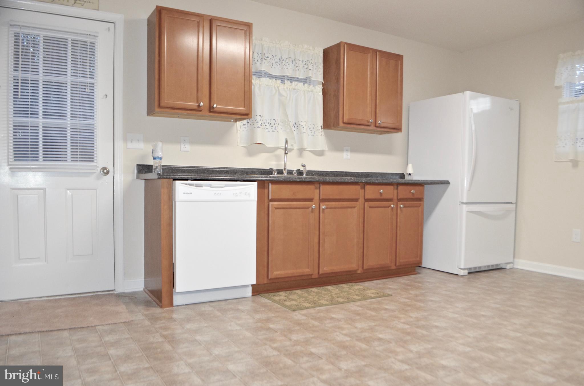 6003 Towles Mill Road Partlow, VA 22534 - Photo 7 of 30 Kitchen with new counters, hardware, and flooring