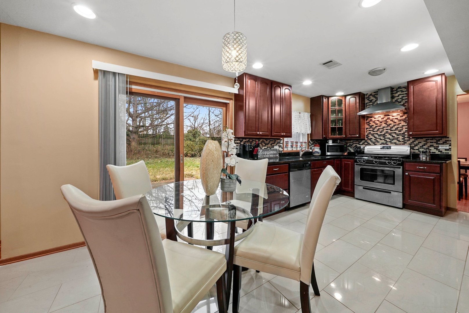 882 Pontiac Lane Carol Stream, IL 60188 - Photo 14 of 30 a view of a dining room with furniture window and outside view