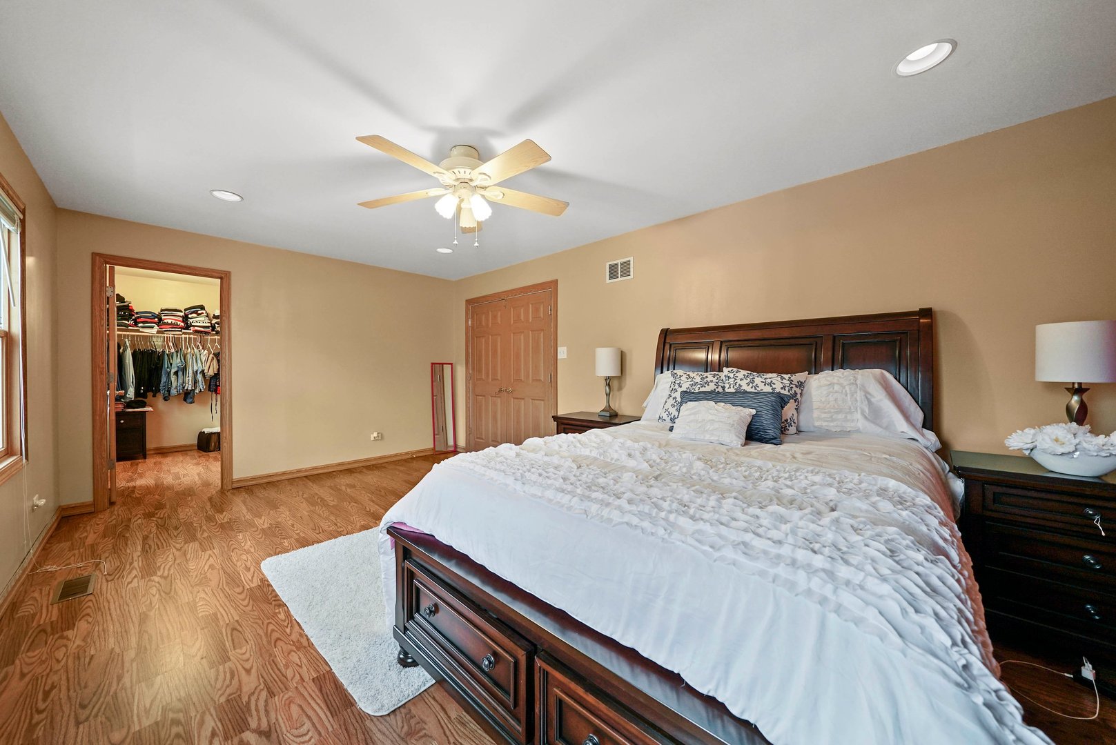 882 Pontiac Lane Carol Stream, IL 60188 - Photo 22 of 30 a bedroom with a bed and wooden floor