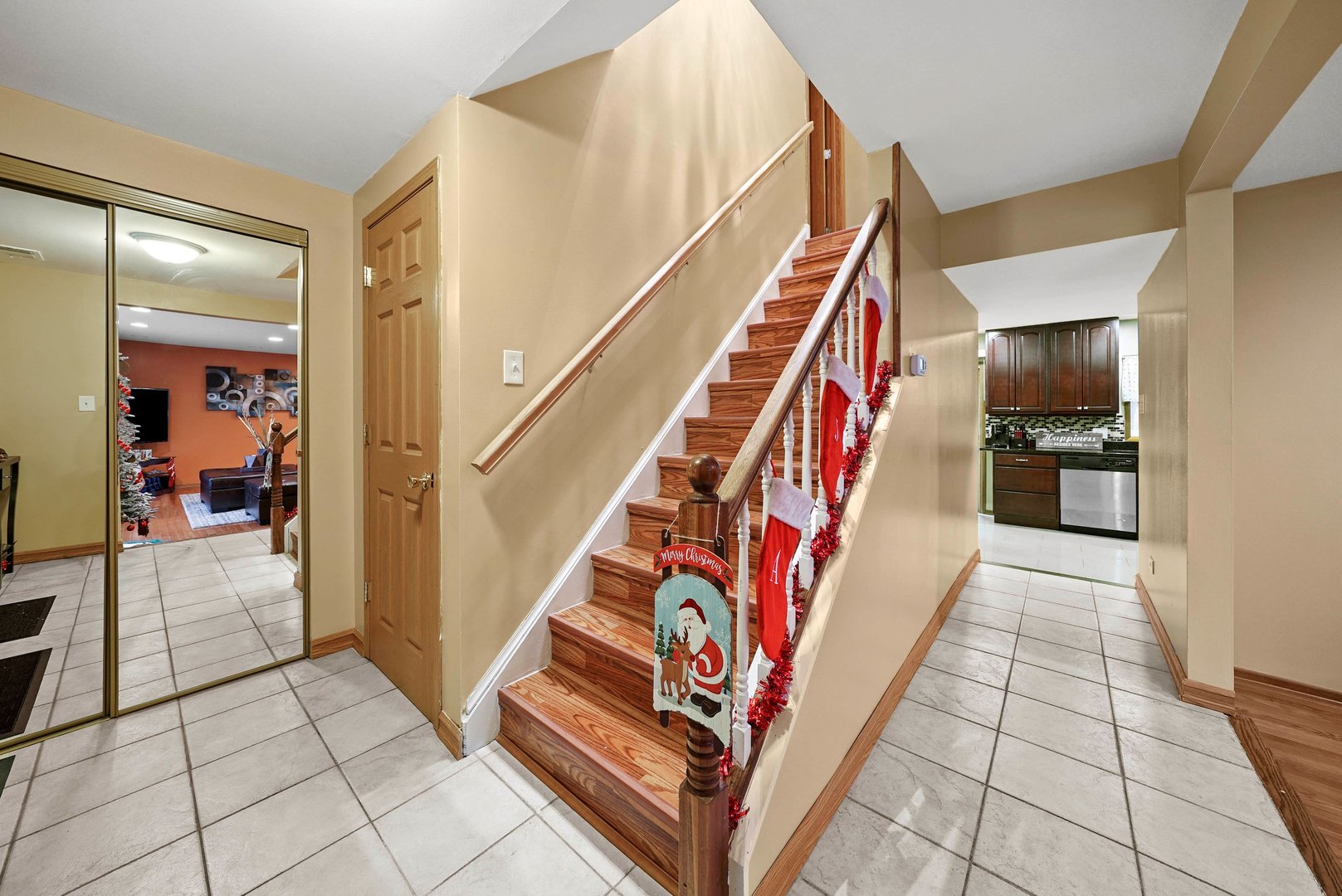 882 Pontiac Lane Carol Stream, IL 60188 - Photo 5 of 30 a view of an entryway with wooden floor and stairs