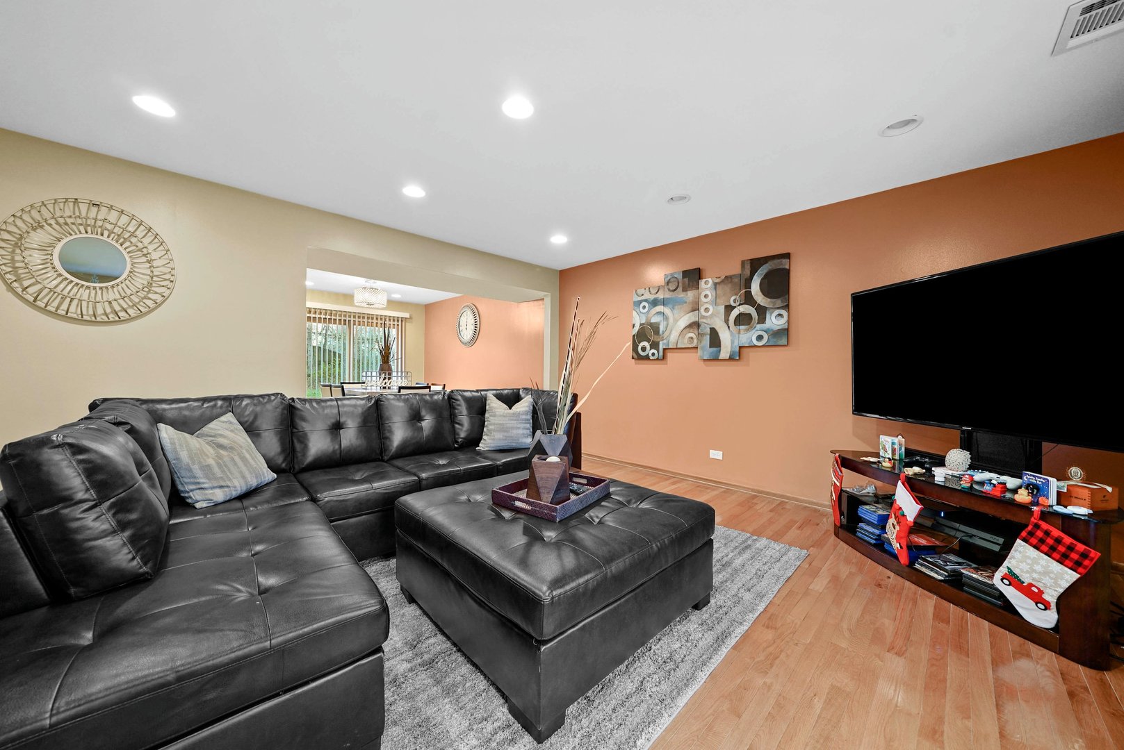 882 Pontiac Lane Carol Stream, IL 60188 - Photo 8 of 30 a living room with furniture and a flat screen tv