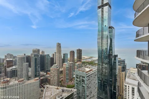 a view of city with tall buildings