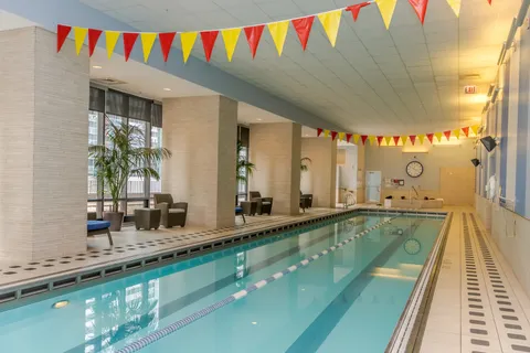 a bathroom with a sink and a large mirror