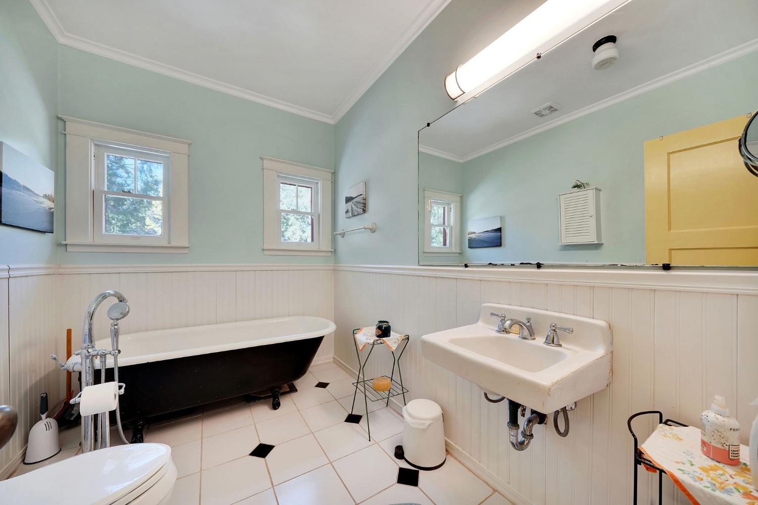 15579 Jesus Maria Road Mokelumne Hill, CA 95245 - Photo 14 of 91 a bathroom with a sink mirror and tub