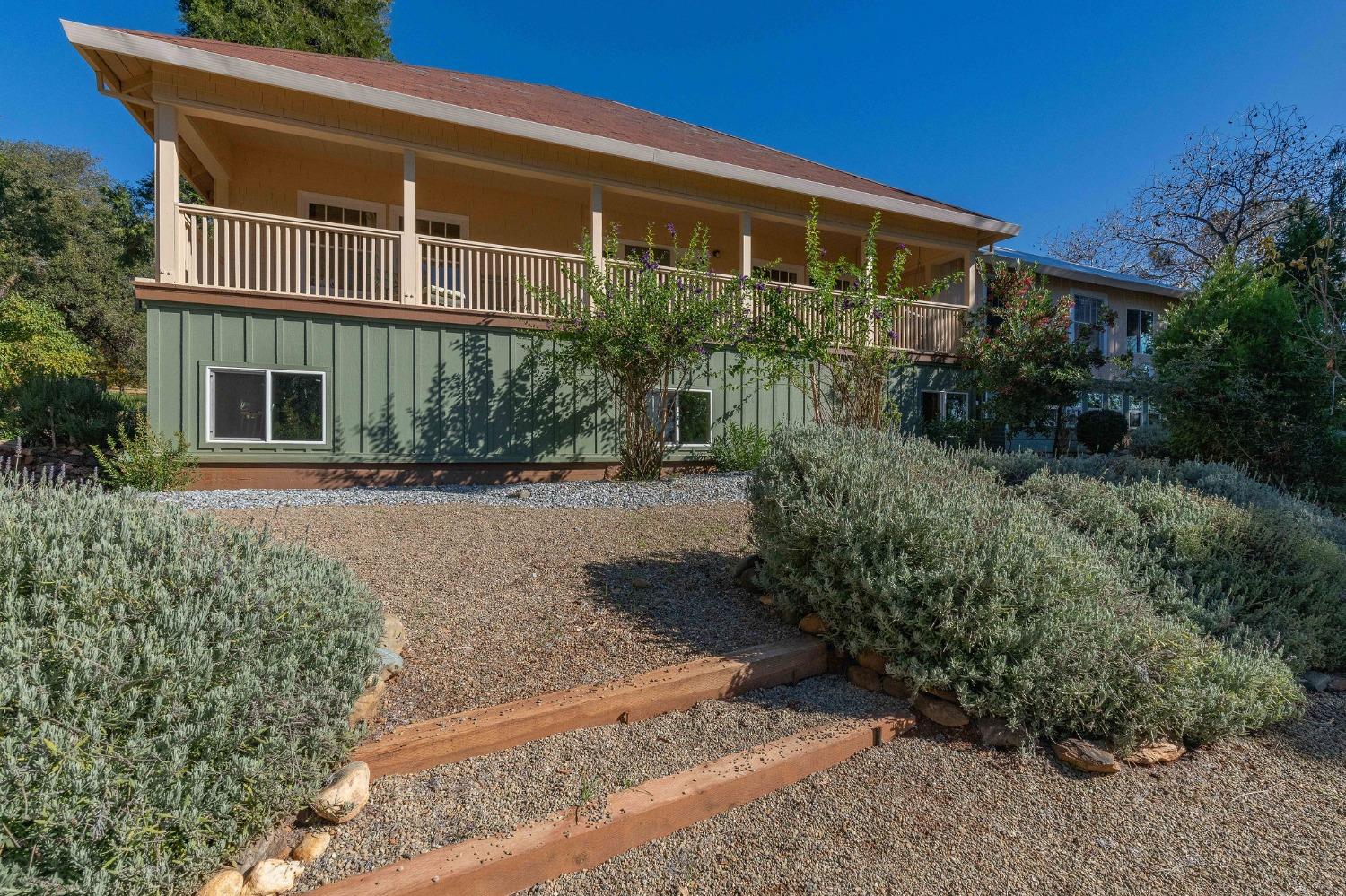 15579 Jesus Maria Road Mokelumne Hill, CA 95245 - Photo 35 of 91 a front view of a house with a yard