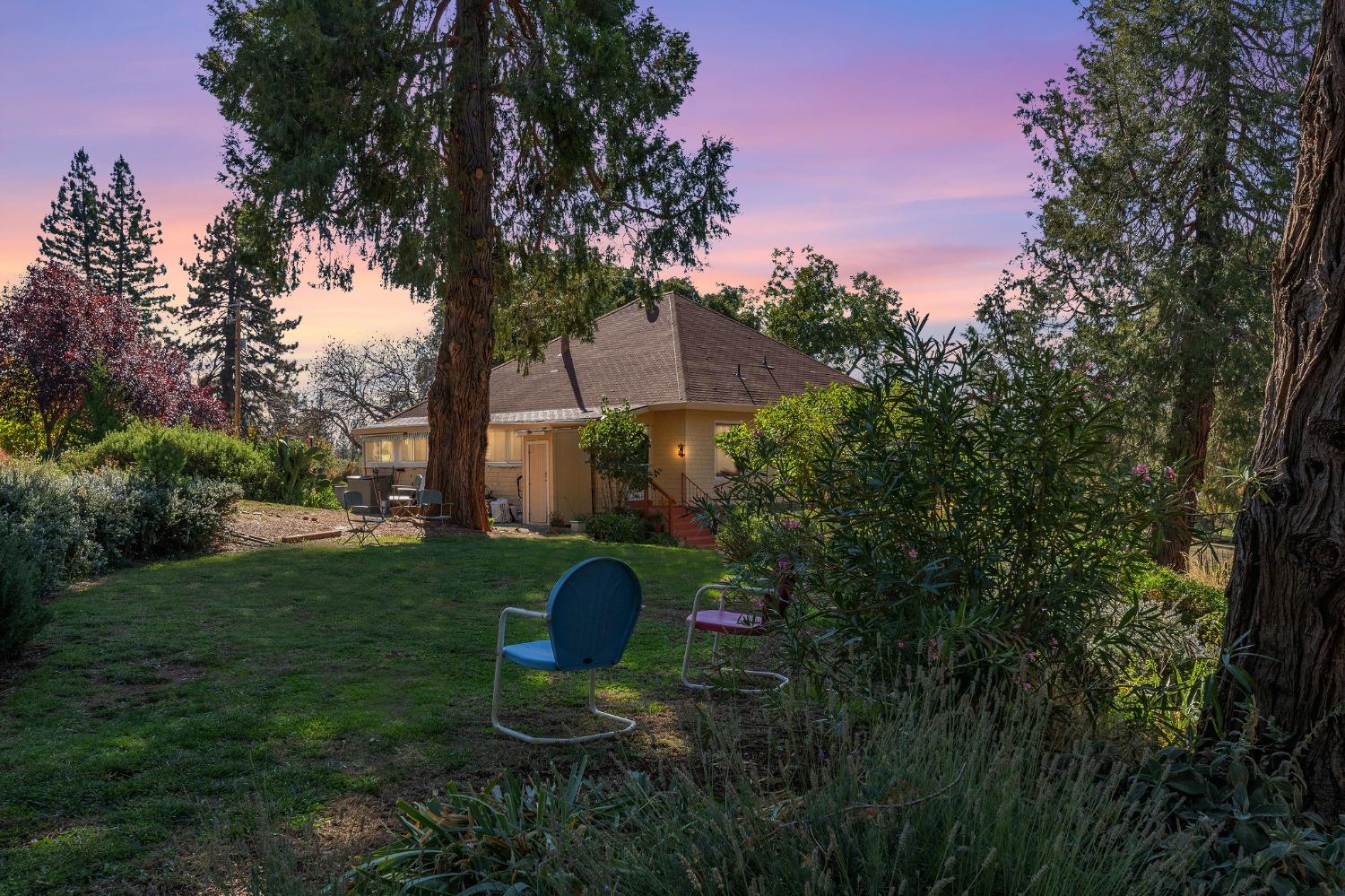 15579 Jesus Maria Road Mokelumne Hill, CA 95245 - Photo 6 of 91 a backyard of a house with table and chairs