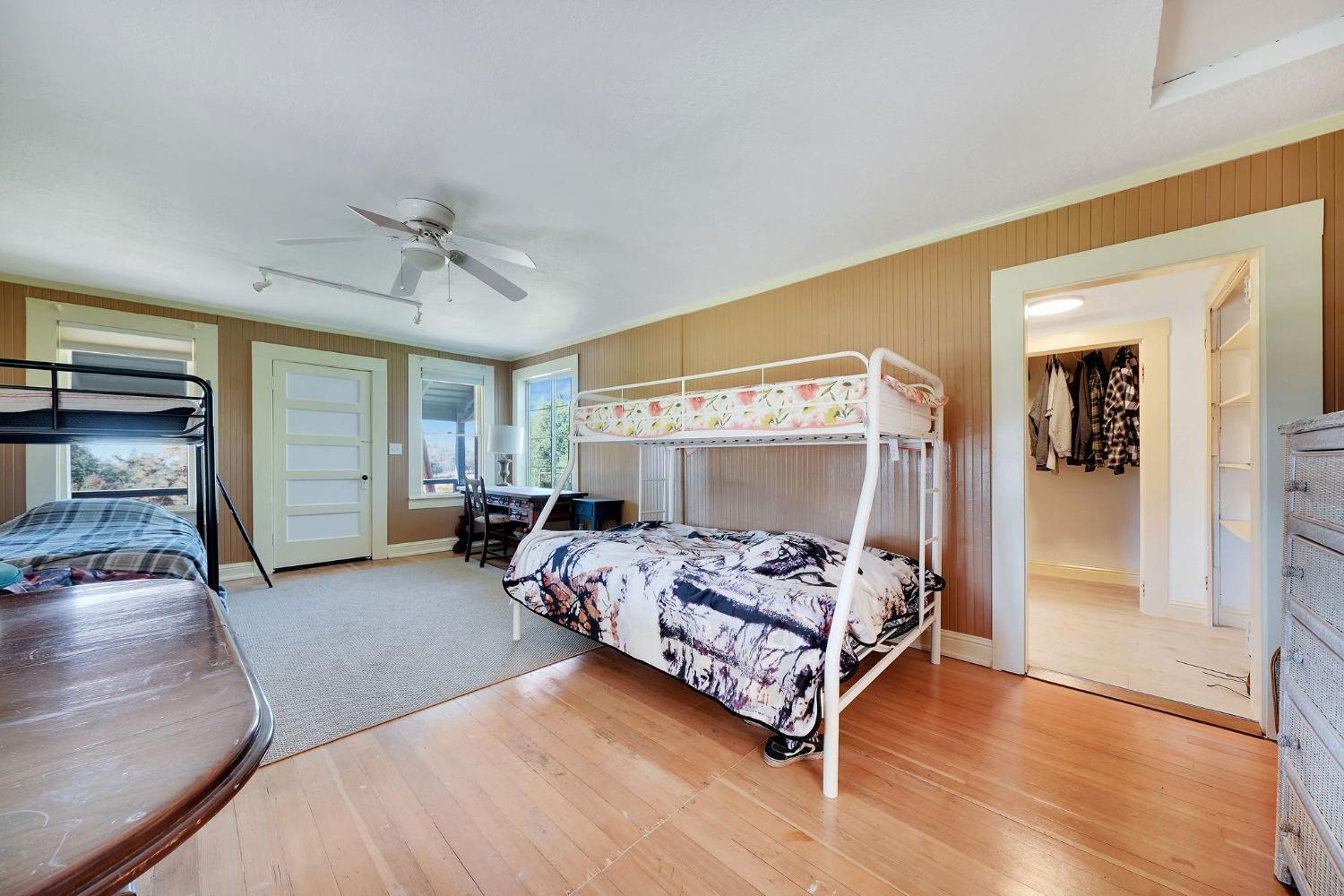 15579 Jesus Maria Road Mokelumne Hill, CA 95245 - Photo 64 of 91 a bedroom with a bed and a mirror