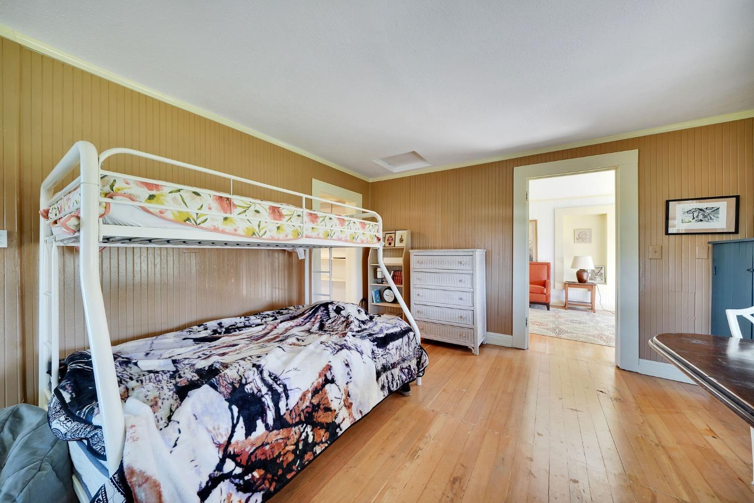 15579 Jesus Maria Road Mokelumne Hill, CA 95245 - Photo 68 of 91 a bedroom with a bed and a mirror