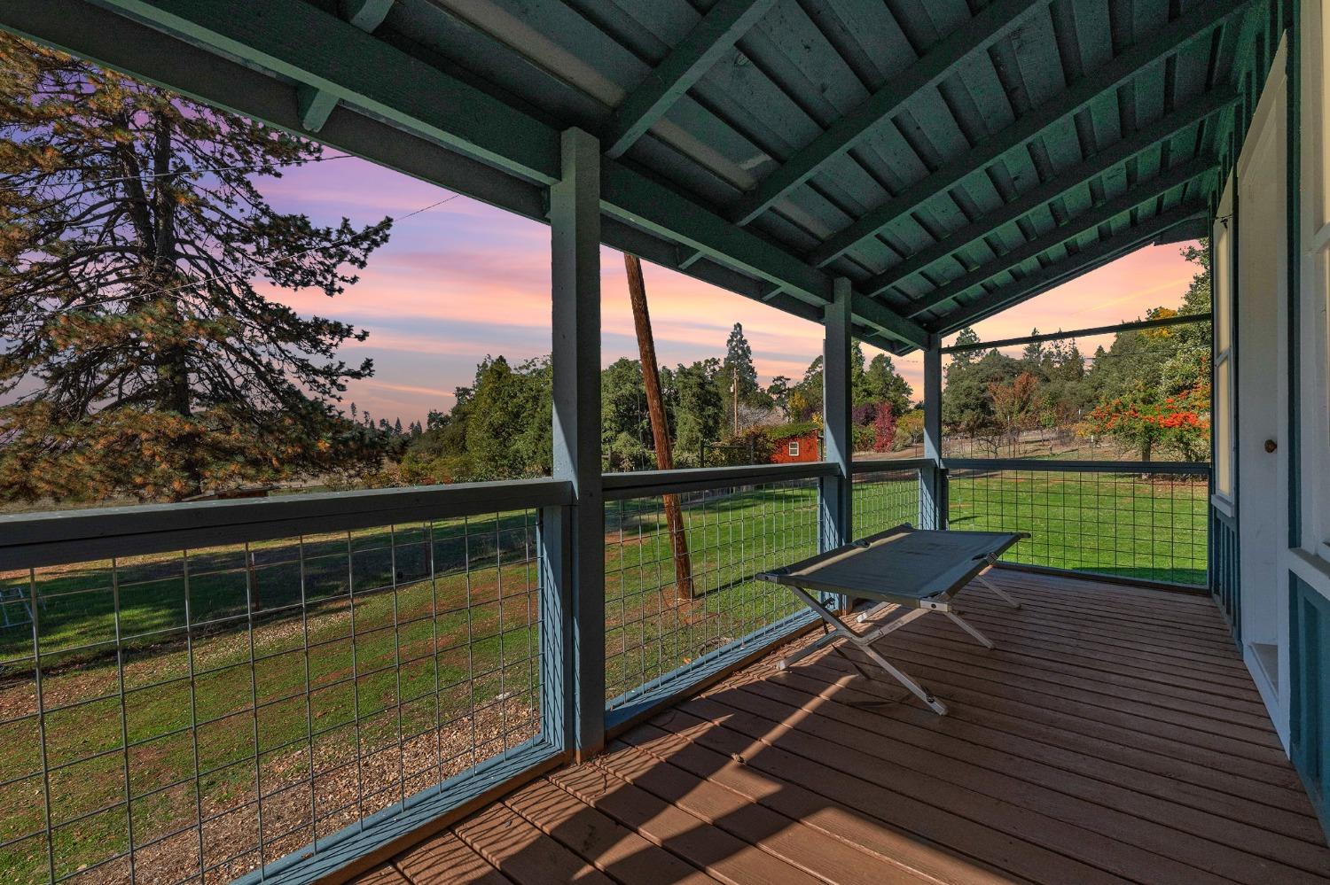 15579 Jesus Maria Road Mokelumne Hill, CA 95245 - Photo 7 of 91 a view of a two chairs in the balcony