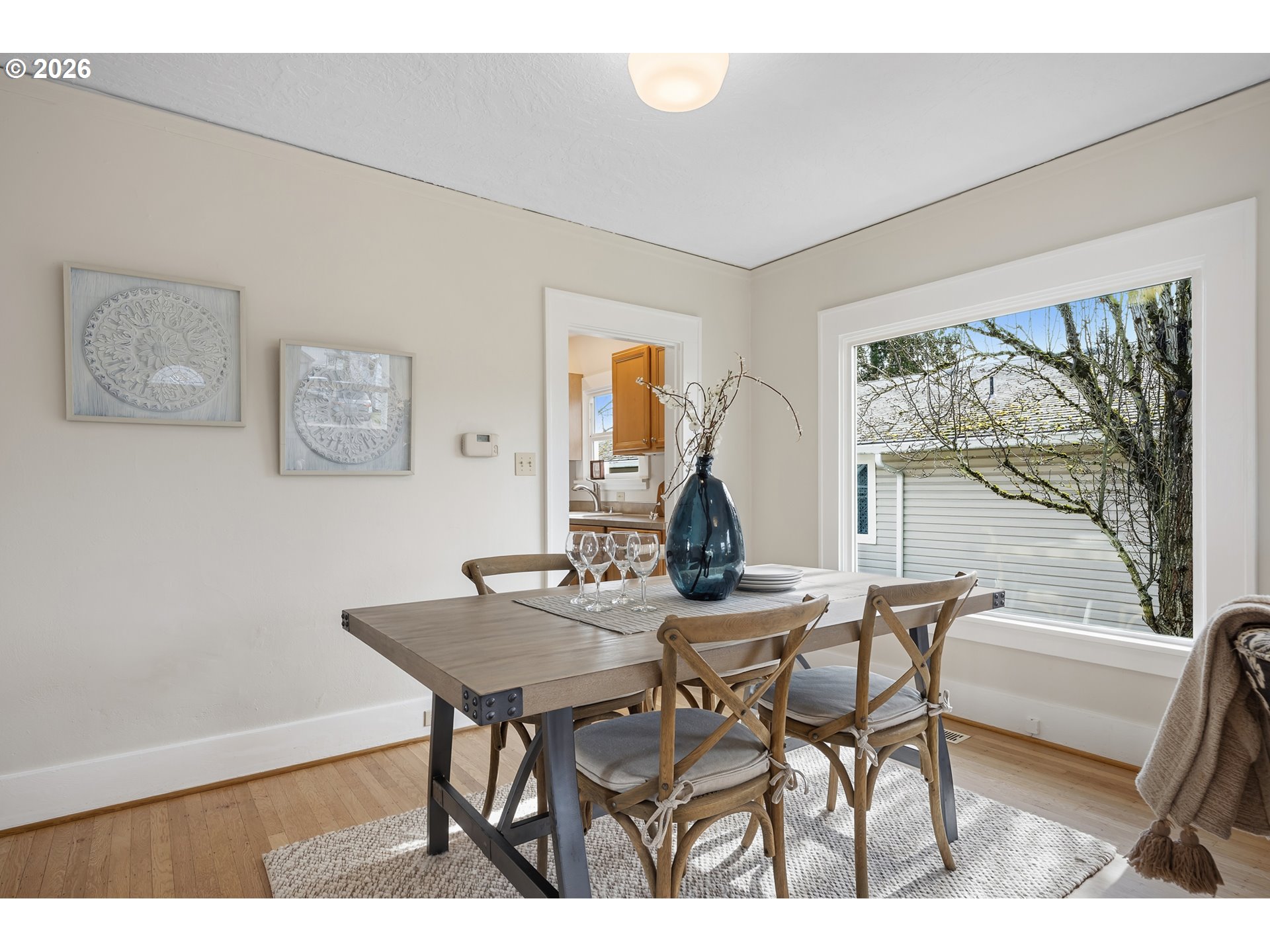 3134 Northeast 74th Avenue Portland, OR 97213 - Photo 12 of 42 a view of a dining room with furniture window and outside view