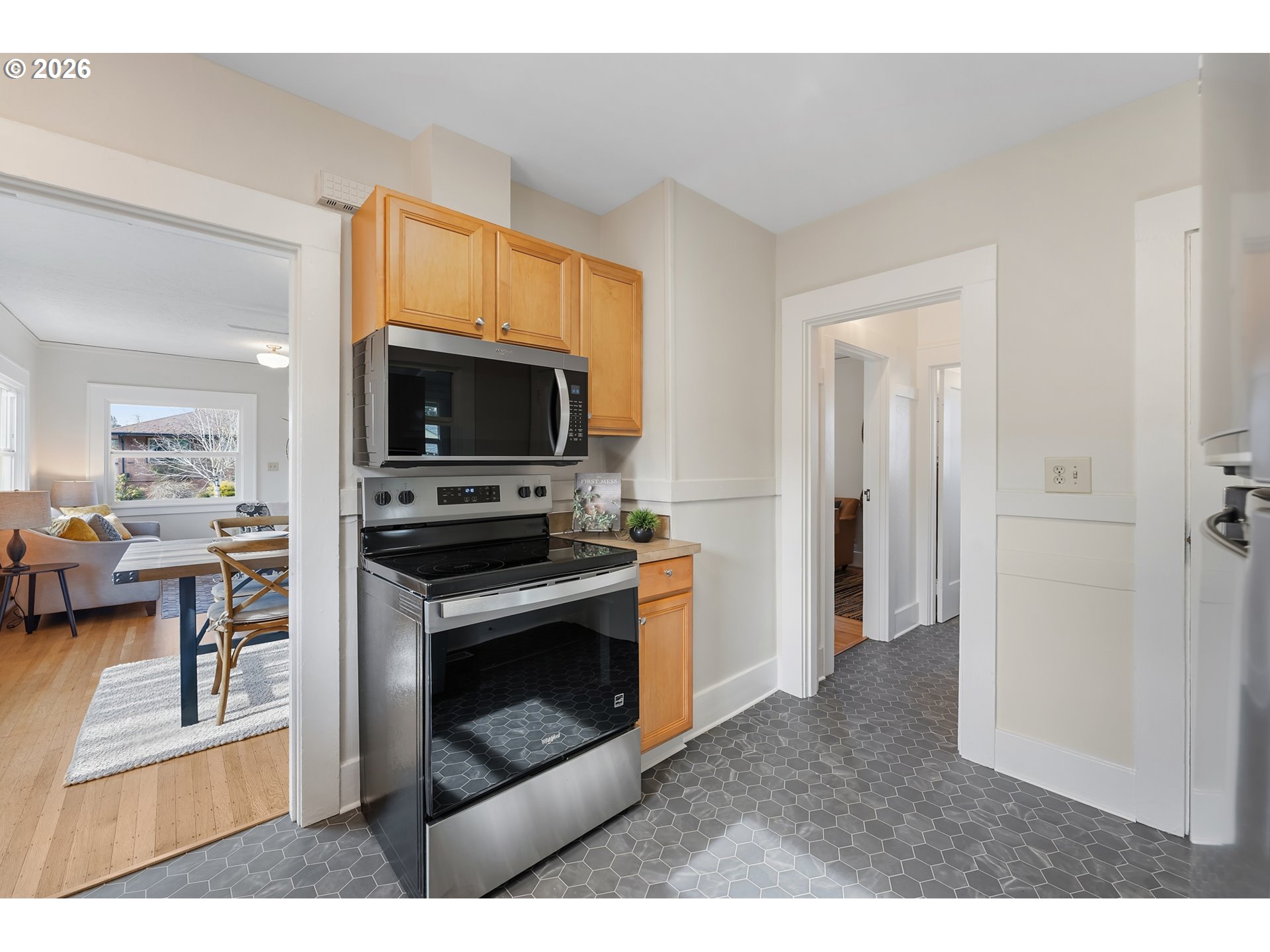 3134 Northeast 74th Avenue Portland, OR 97213 - Photo 17 of 42 a kitchen with a stove and a microwave