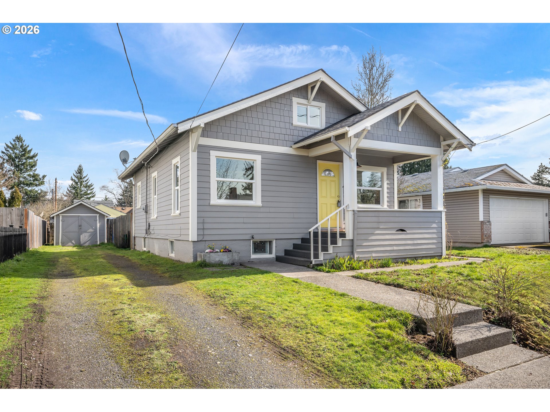 3134 Northeast 74th Avenue Portland, OR 97213 - Photo 2 of 42 a front view of a house with a yard