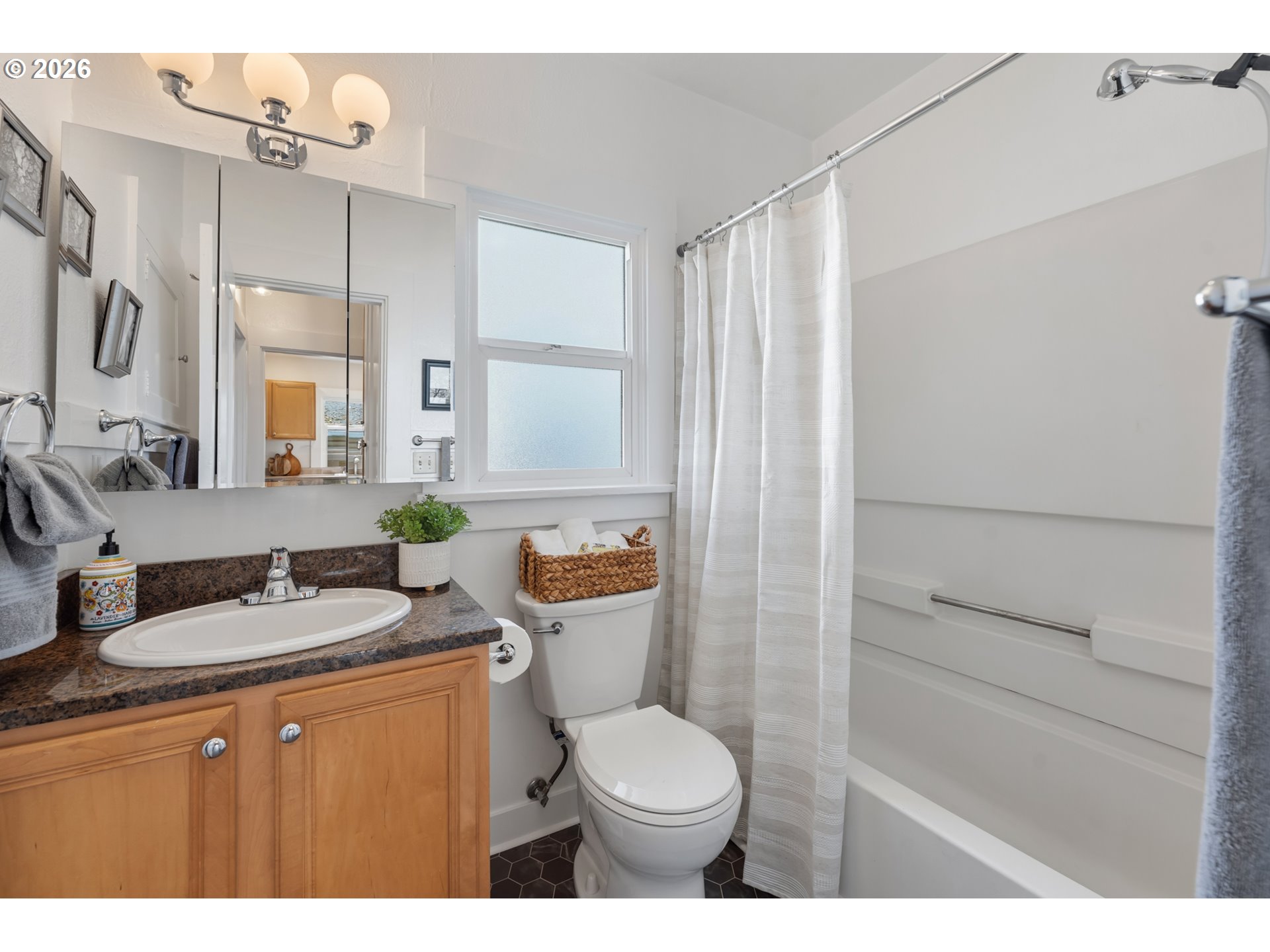 3134 Northeast 74th Avenue Portland, OR 97213 - Photo 28 of 42 a bathroom with a granite countertop sink toilet and shower