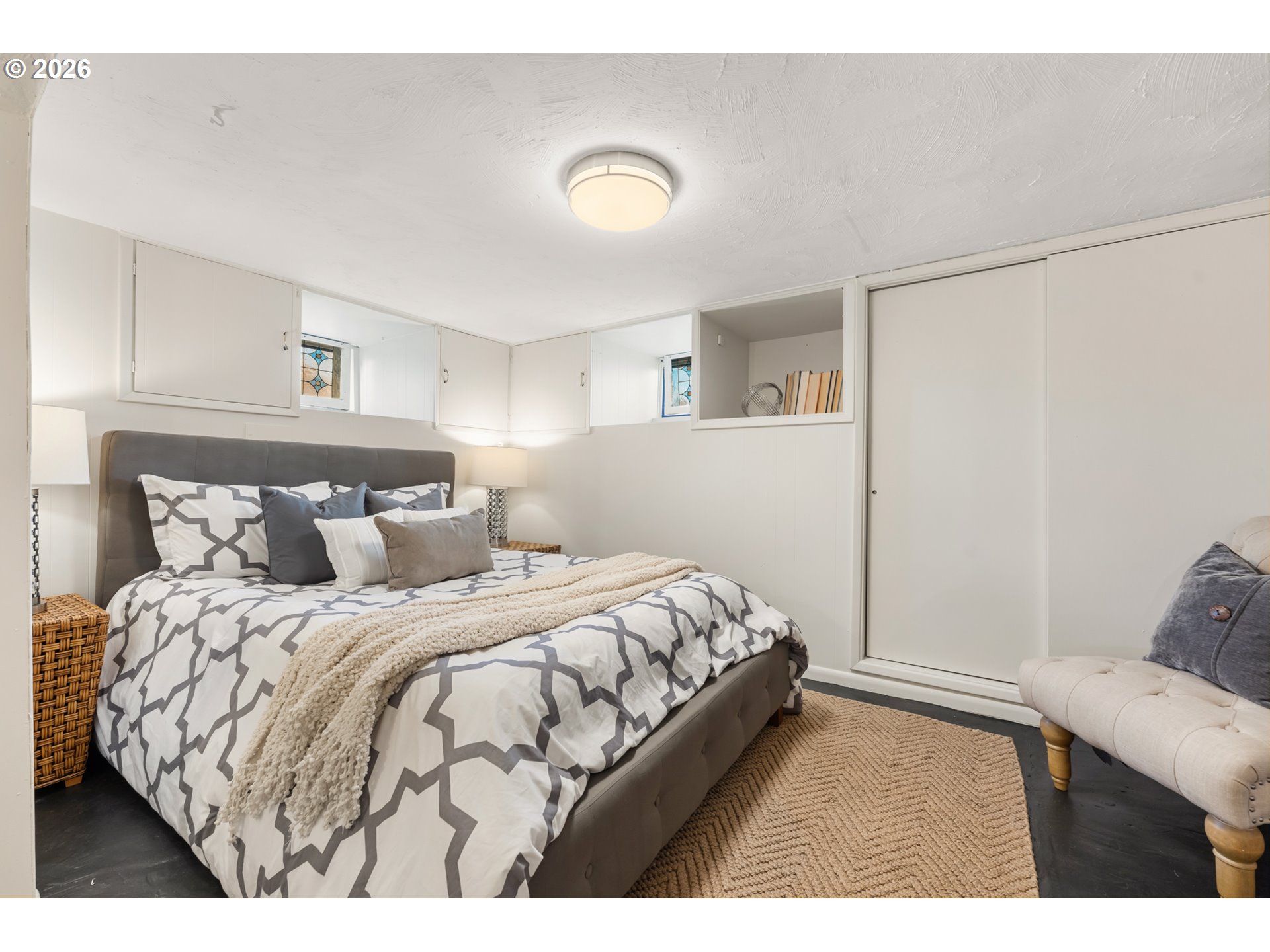 3134 Northeast 74th Avenue Portland, OR 97213 - Photo 30 of 42 a bedroom with a bed and a window