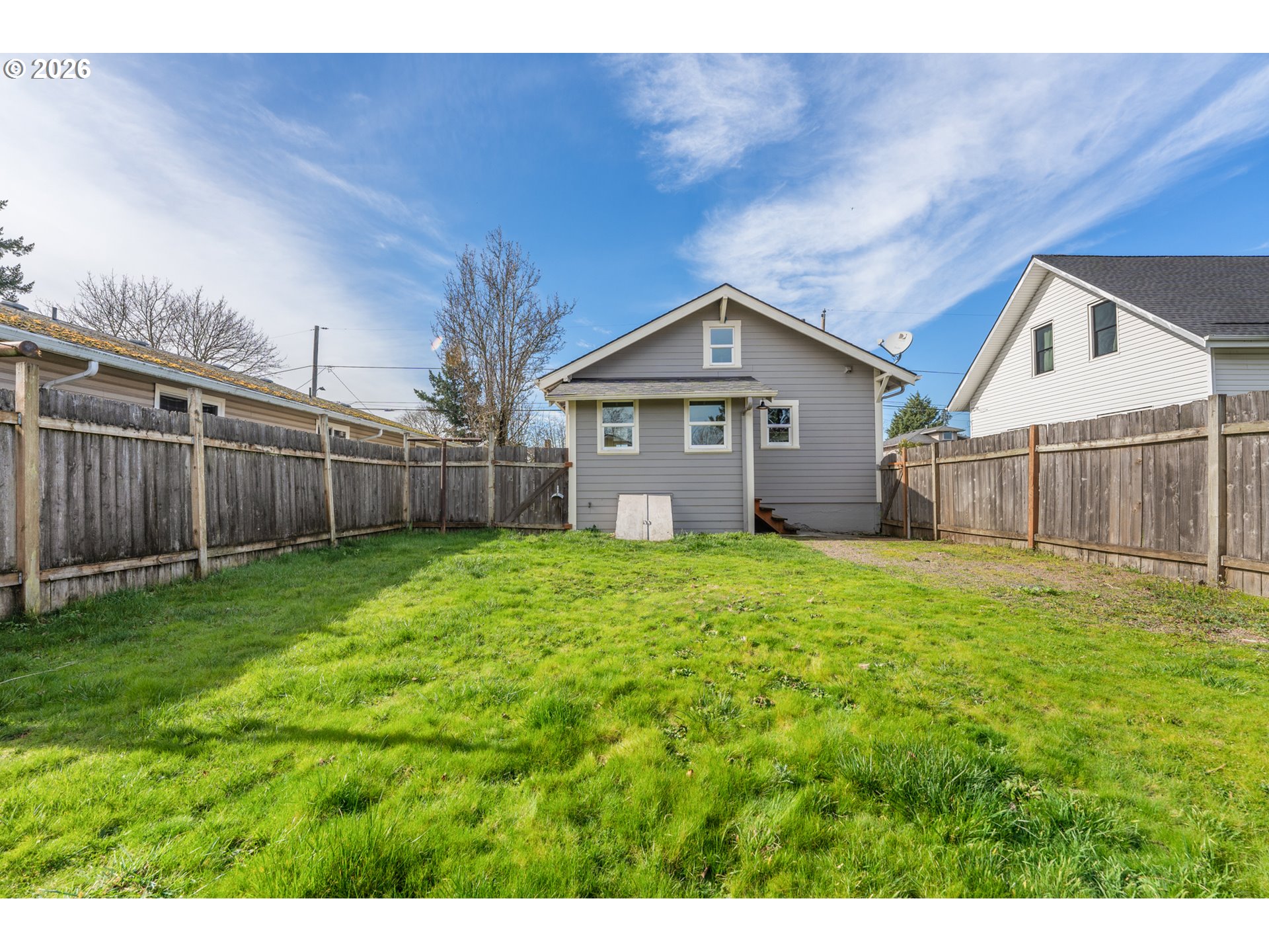 3134 Northeast 74th Avenue Portland, OR 97213 - Photo 38 of 42 a view of a house with a big yard plants and large tree