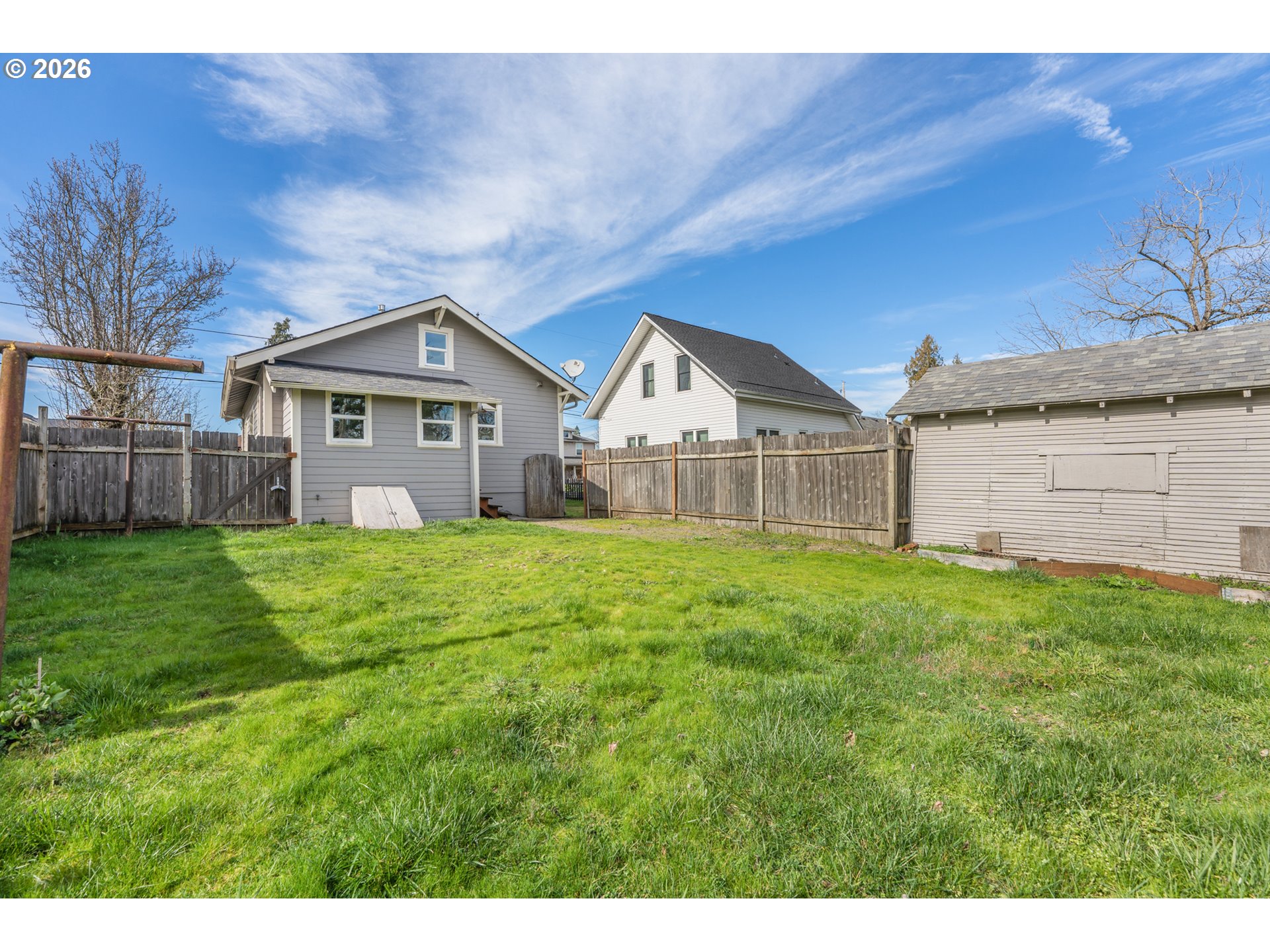 3134 Northeast 74th Avenue Portland, OR 97213 - Photo 39 of 42 a view of a house with a big yard and large tree