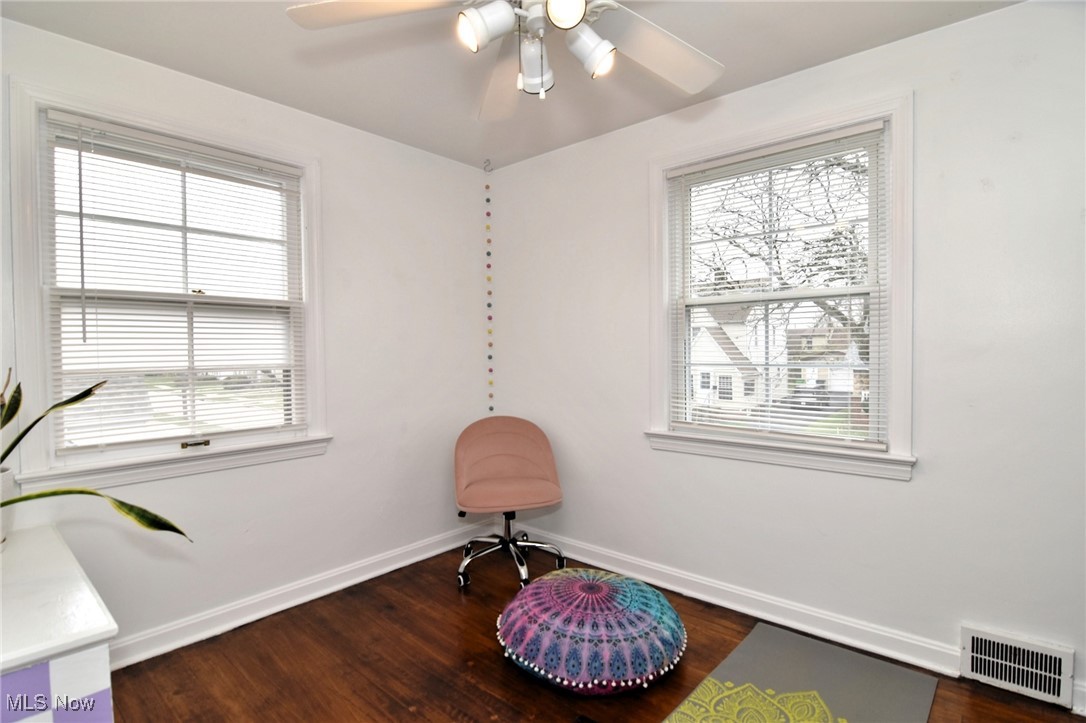 3921 Grosvenor Road Cleveland, OH 44118 - Photo 35 of 46 Living area featuring healthy amount of natural light and wood finished floors