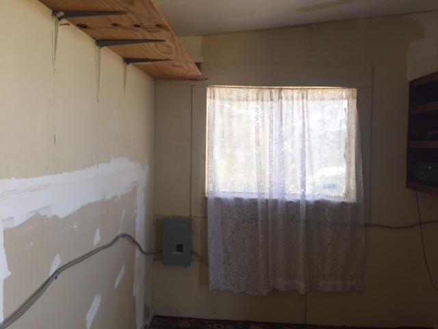 9270 Frontage Road West Mojave, CA 93501 - Photo 4 of 7 a bathroom with a window and a shower