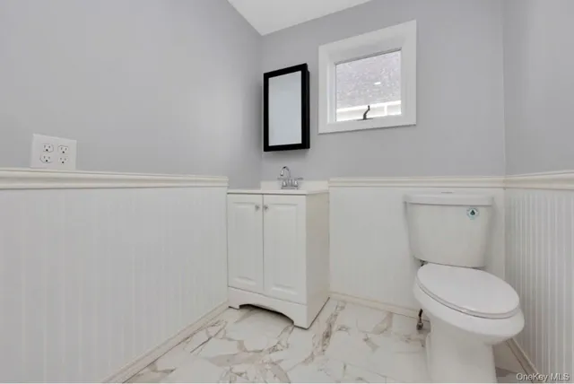 a bathroom with a toilet