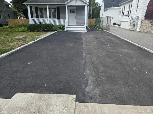 a view of a house with a garden