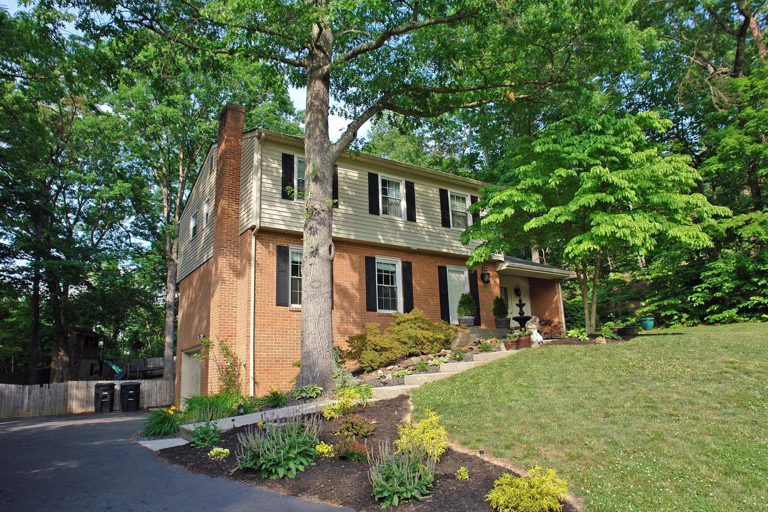 2969 Tree Swallow Road Roanoke, VA 24018 - Photo 2 of 31 a front view of a house with garden